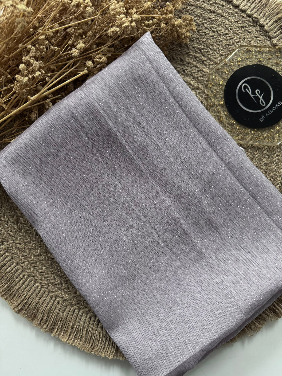 Elegant metallic silk shimmer hijab by RF Abayas featuring a luxurious, shimmering metallic fabric with a silky texture.