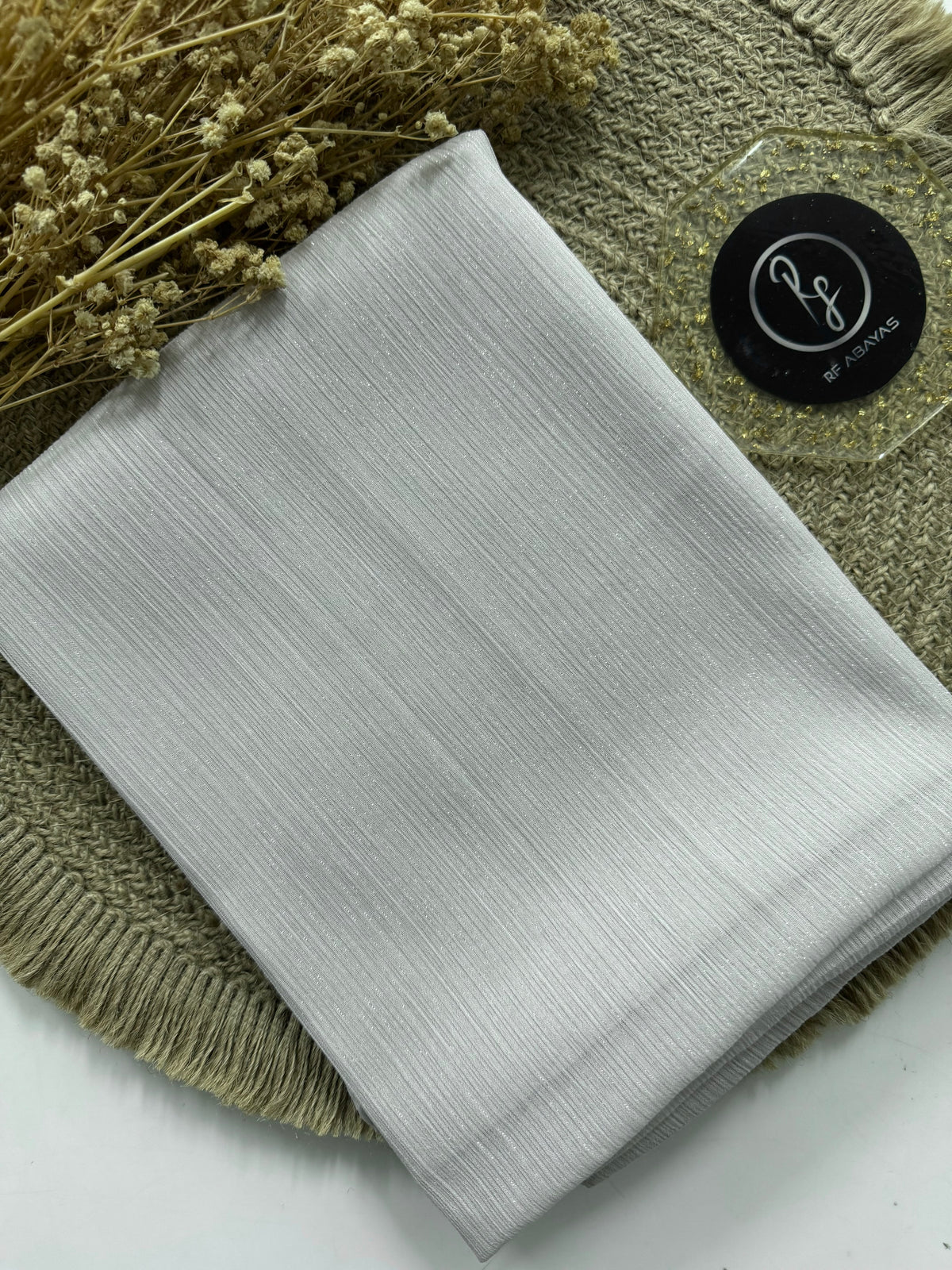 Elegant RF Abayas metallic silk shimmer hijab in a luxurious shiny fabric with a smooth, flowing drape.