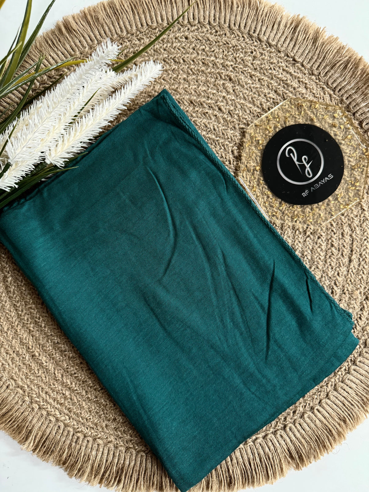 RF Abayas bamboo jersey hijab in soft, breathable fabric, draped elegantly with natural folds and a smooth texture.