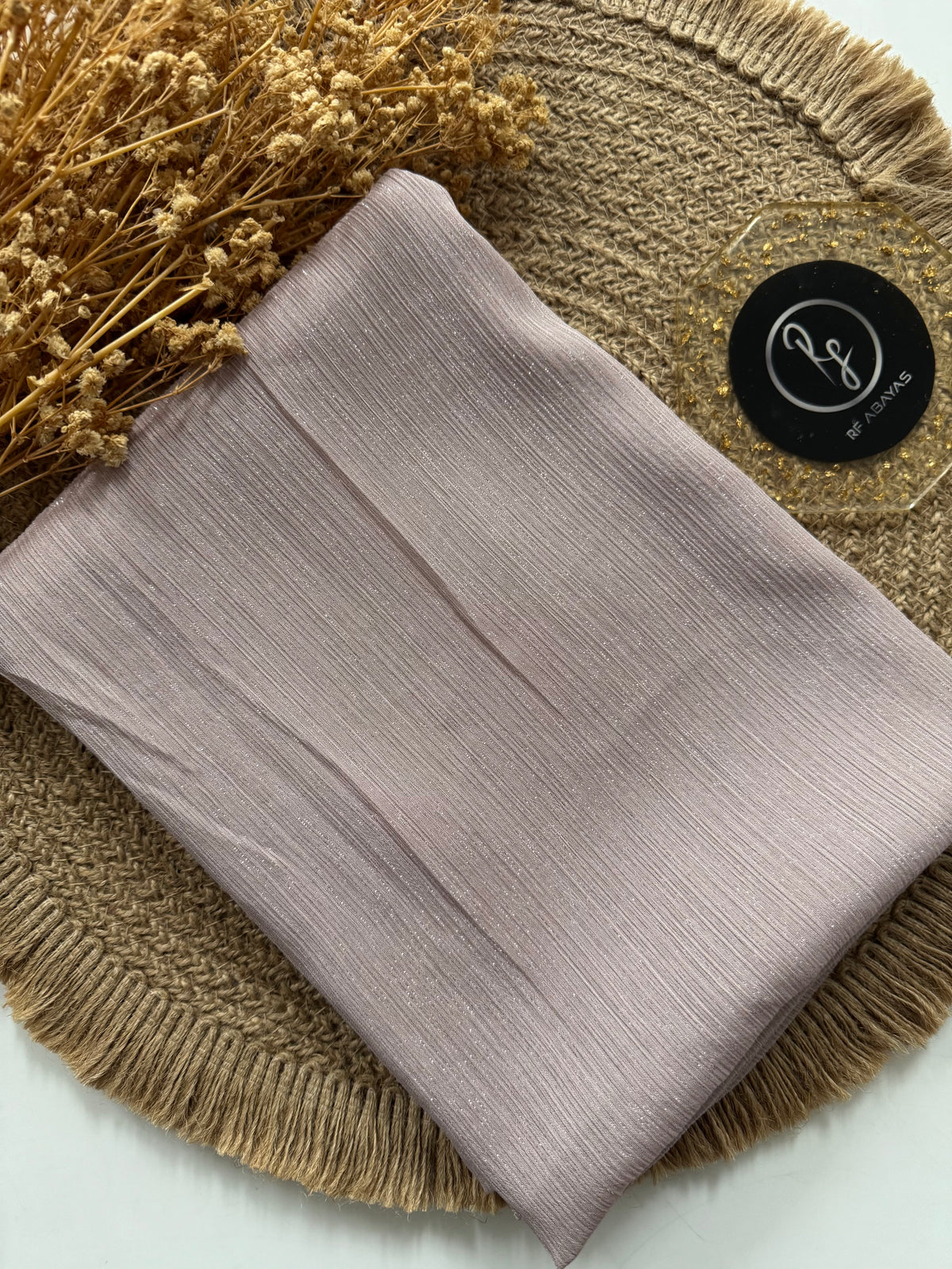 Elegant RF Abayas metallic silk shimmer hijab in luxurious metallic fabric, showcasing a smooth, shimmering hijab style.
