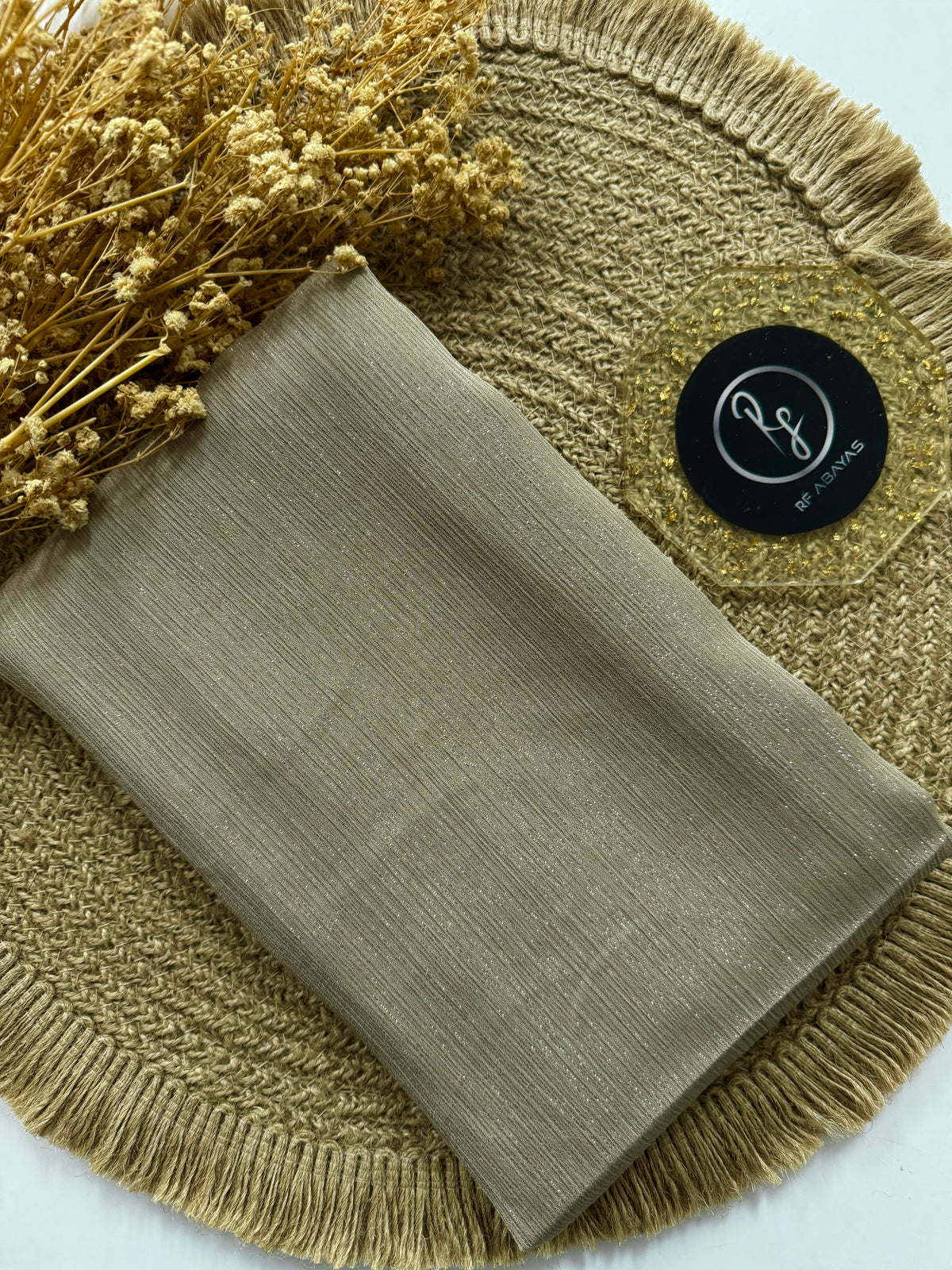 Elegant RF Abayas metallic silk shimmer hijab in luxurious metallic silk fabric with a shimmering finish.