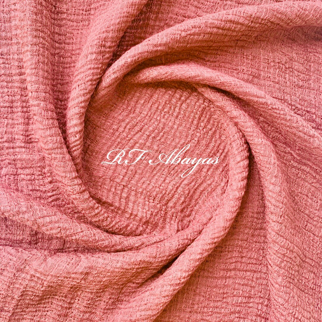Heavy crinkled maroon cotton hijab from RF Abayas, showcasing textured, lightweight fabric with a flowing drape.