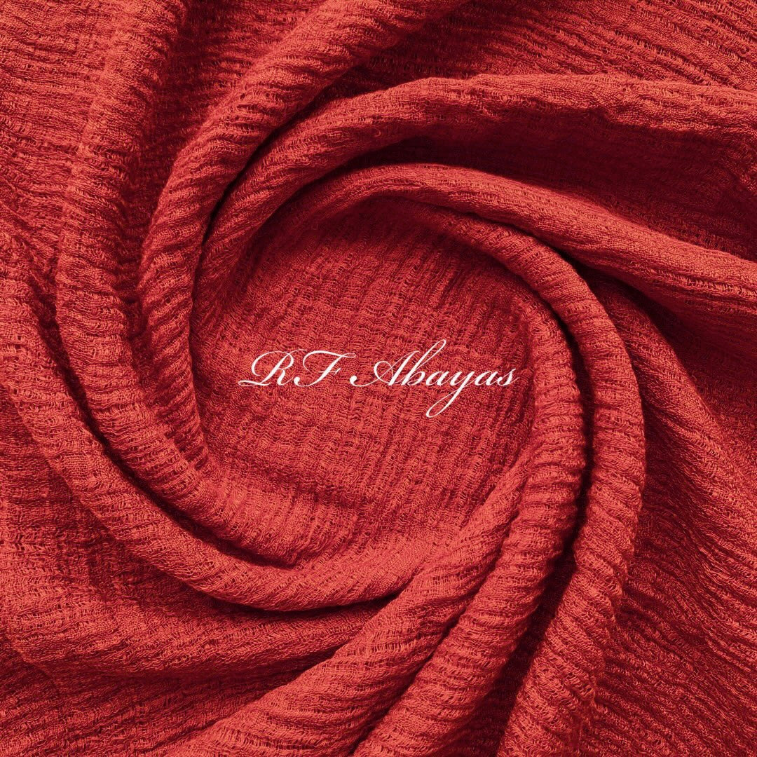 Heavy crinkled maroon cotton hijab by RF Abayas featuring textured, breathable fabric and elegant drape.