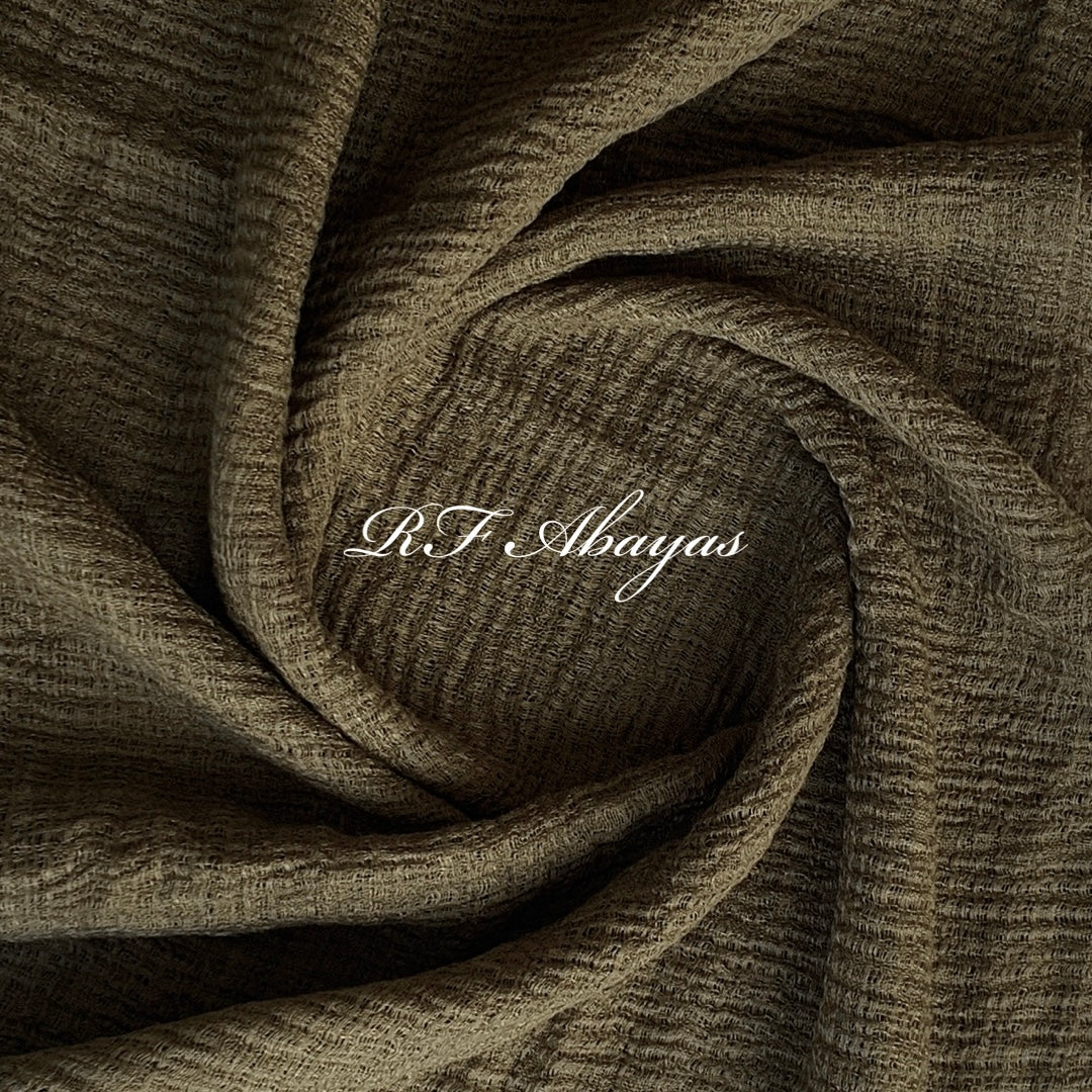 Heavy crinkled cotton hijab by RF Abayas in a meroon color, showcasing soft, textured fabric and elegant drape.