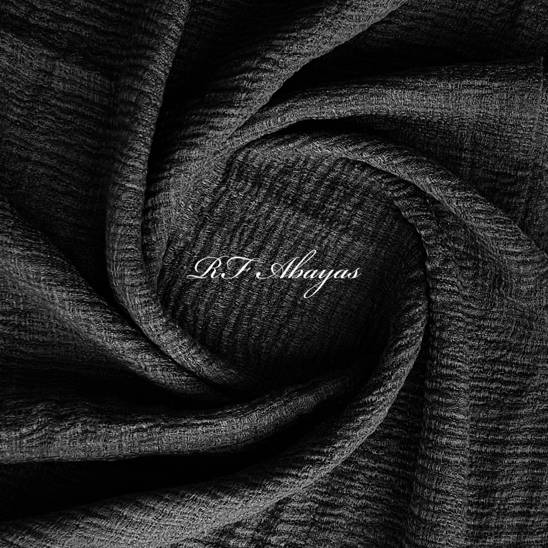 Heavy crinkled cotton hijab by RF Abayas in a meroon color, showcasing textured, lightweight fabric with elegant drape.