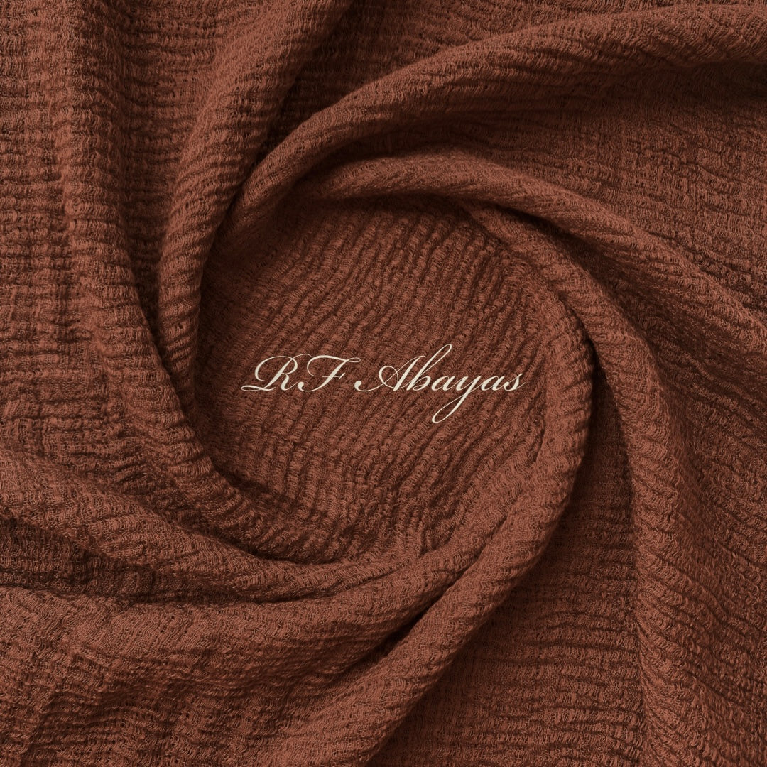 Heavy crinkled cotton hijab from RF Abayas in meroon color, showcasing soft, textured fabric and elegant drape.