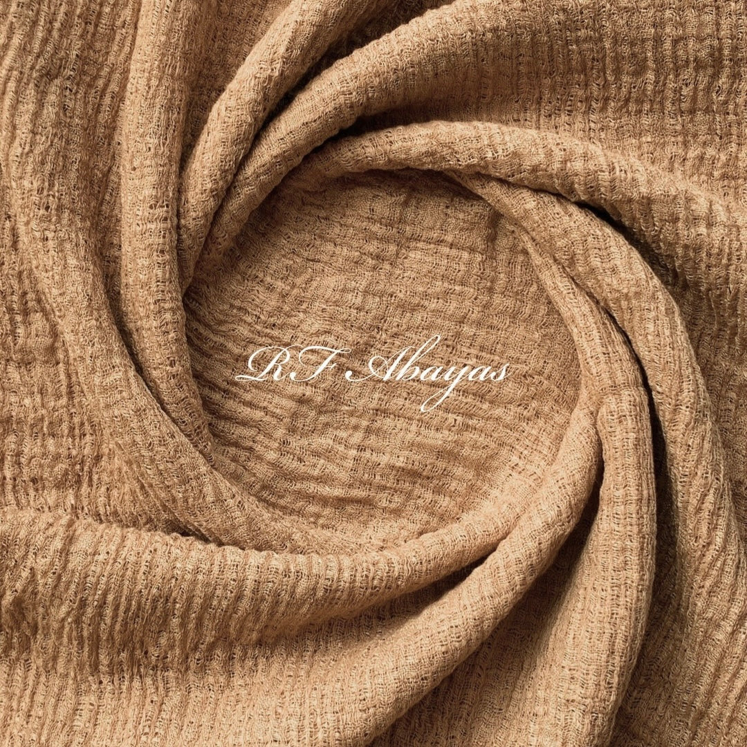 Heavy crinkled cotton hijab by RF Abayas, showcasing a textured maroon fabric with a lightweight, stylish design.