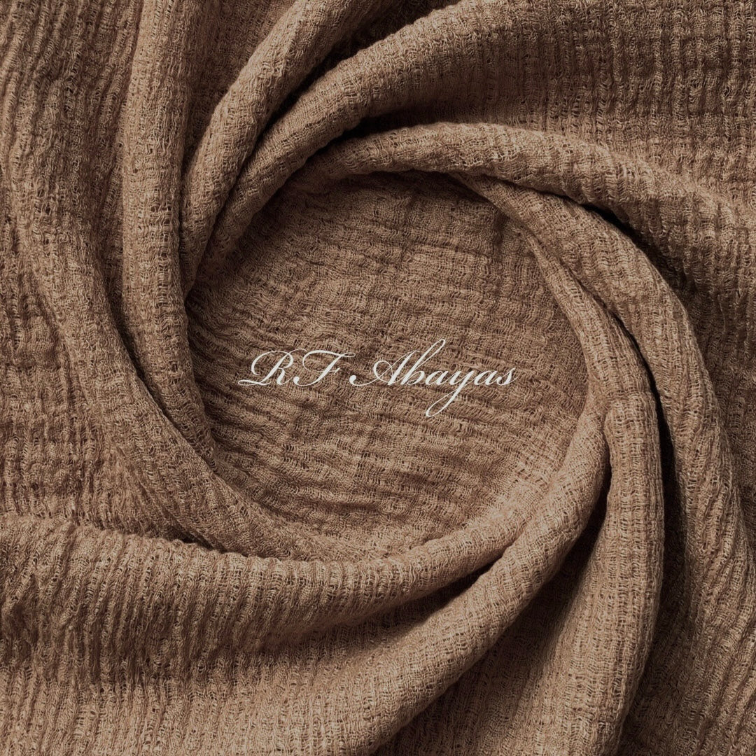 Heavy crinkled cotton hijab by RF Abayas in meroon color, showcasing soft, textured fabric with a flowing drape.