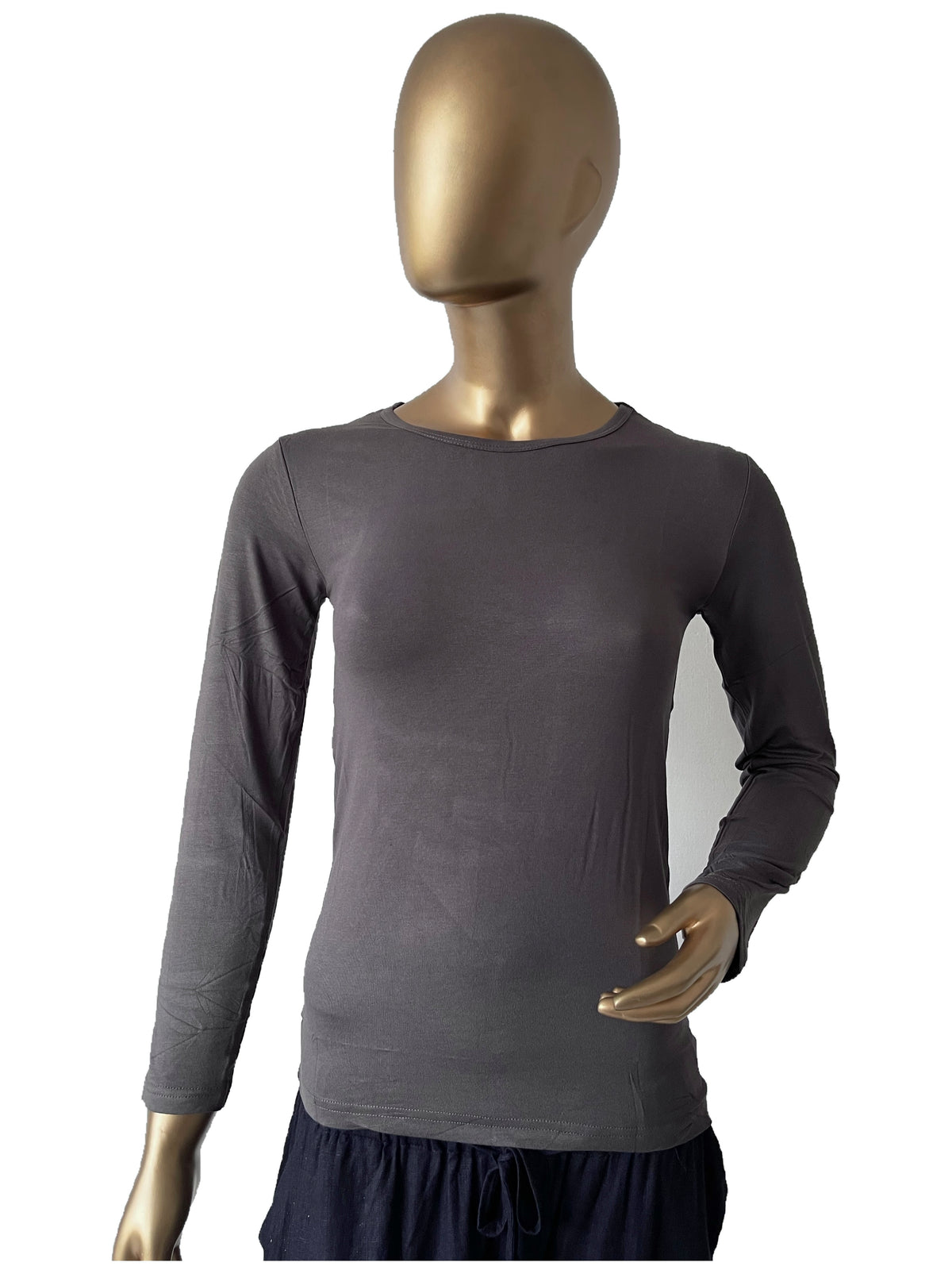 Black women's full sleeve innerwear in XL size by RF Abayas, close-up of comfortable fabric and elegant design.