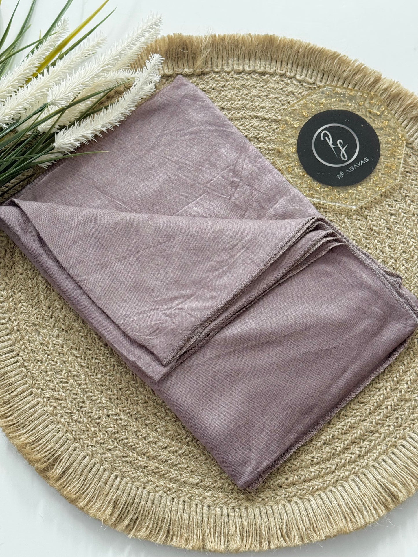 RF Abayas bamboo jersey hijab in soft, breathable fabric, shown in a versatile drape style on a neutral background.