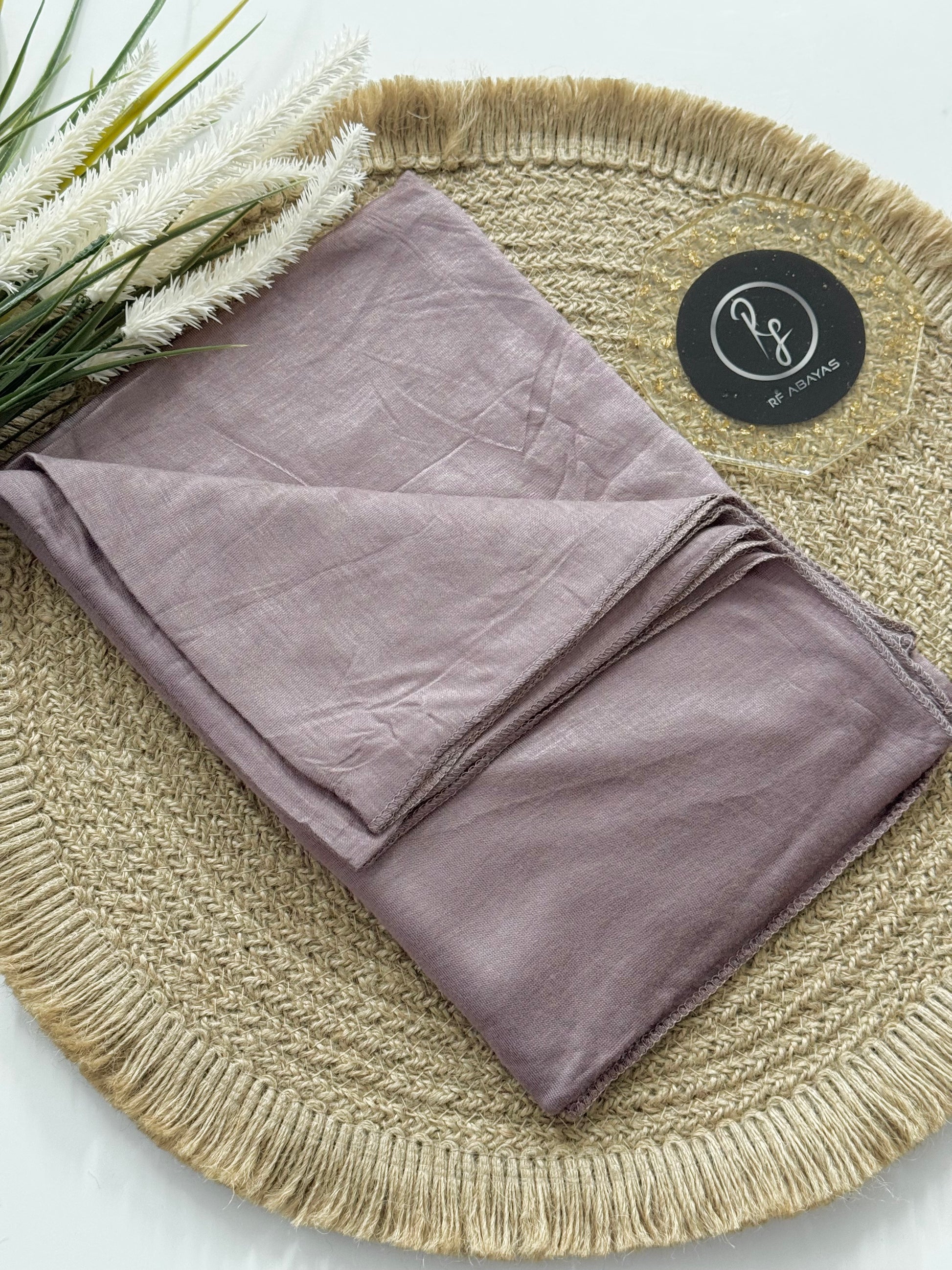 RF Abayas bamboo jersey hijab in soft, breathable fabric, shown in a versatile drape style on a neutral background.