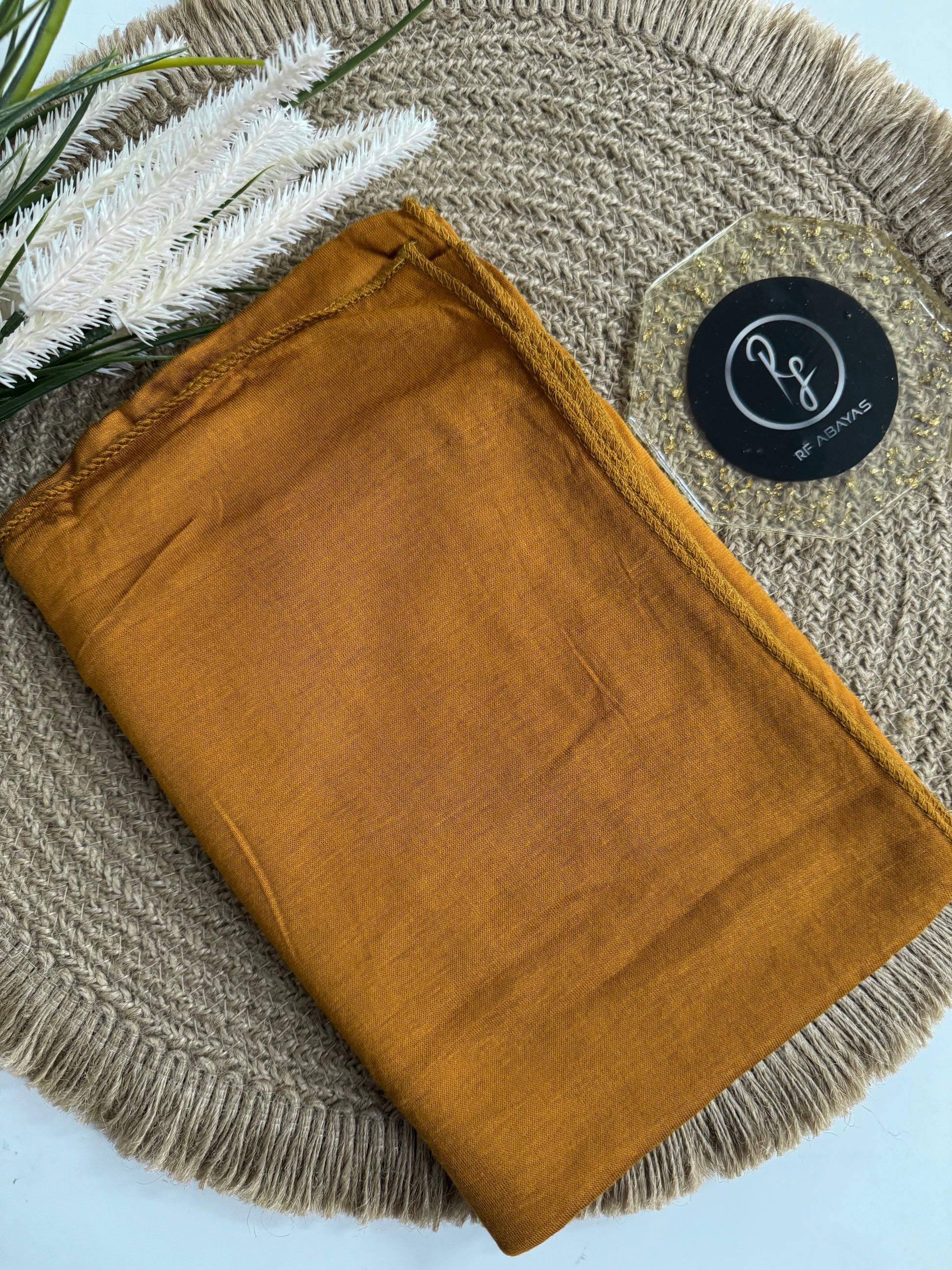 RF Abayas bamboo jersey hijab in soft, natural fabric, showcasing a lightweight, comfortable design with gentle drape and neutral color.