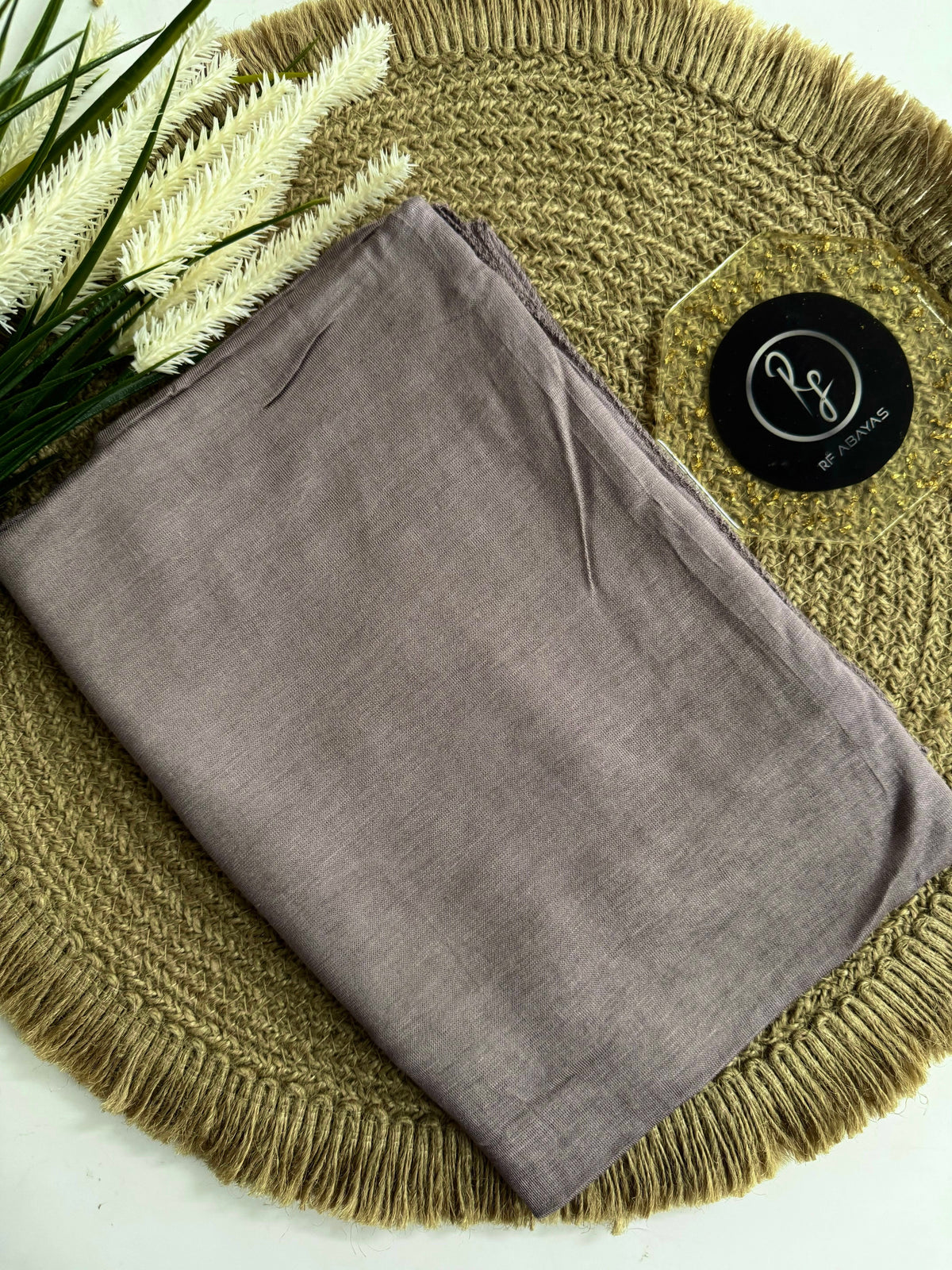 Soft bamboo jersey hijab by RF Abayas in a flowing, lightweight fabric with a smooth texture and neutral color.