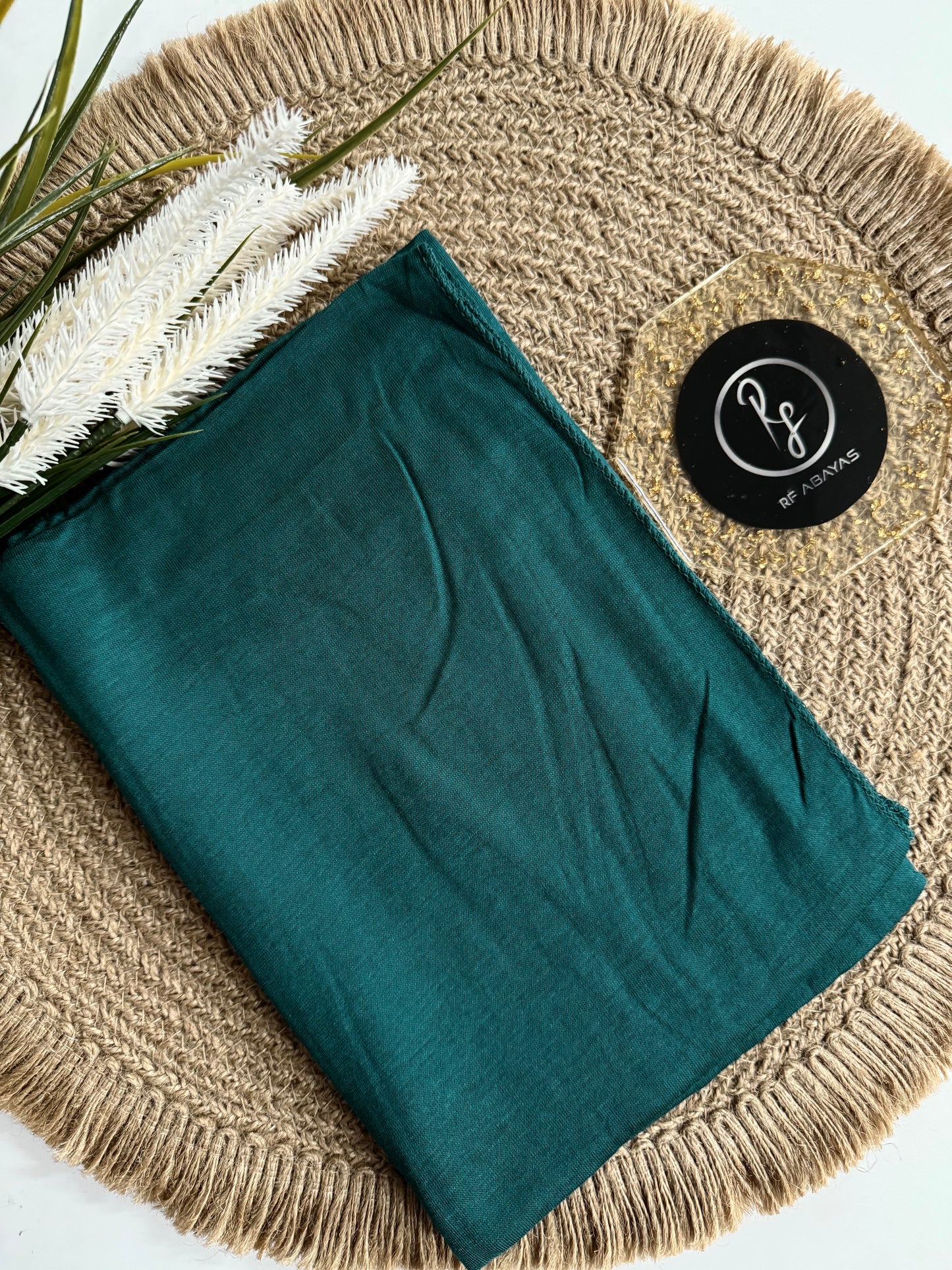RF Abayas bamboo jersey hijab in soft, breathable fabric, draped elegantly with natural folds and a smooth texture.