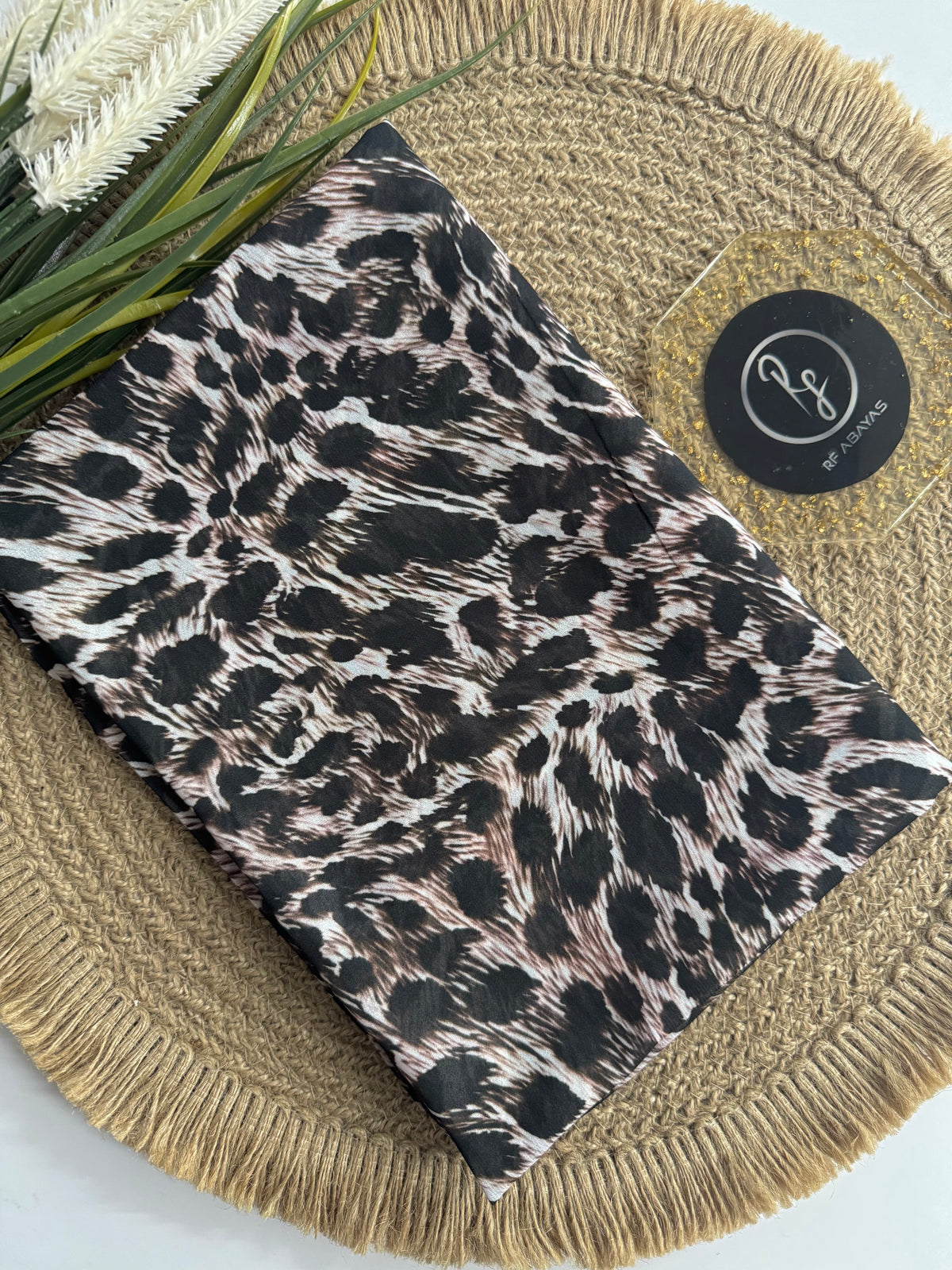 Animal print chiffon hijab from RF Abayas, lightweight and stylish with a bold animal pattern, perfect for fashionable modest wear.
