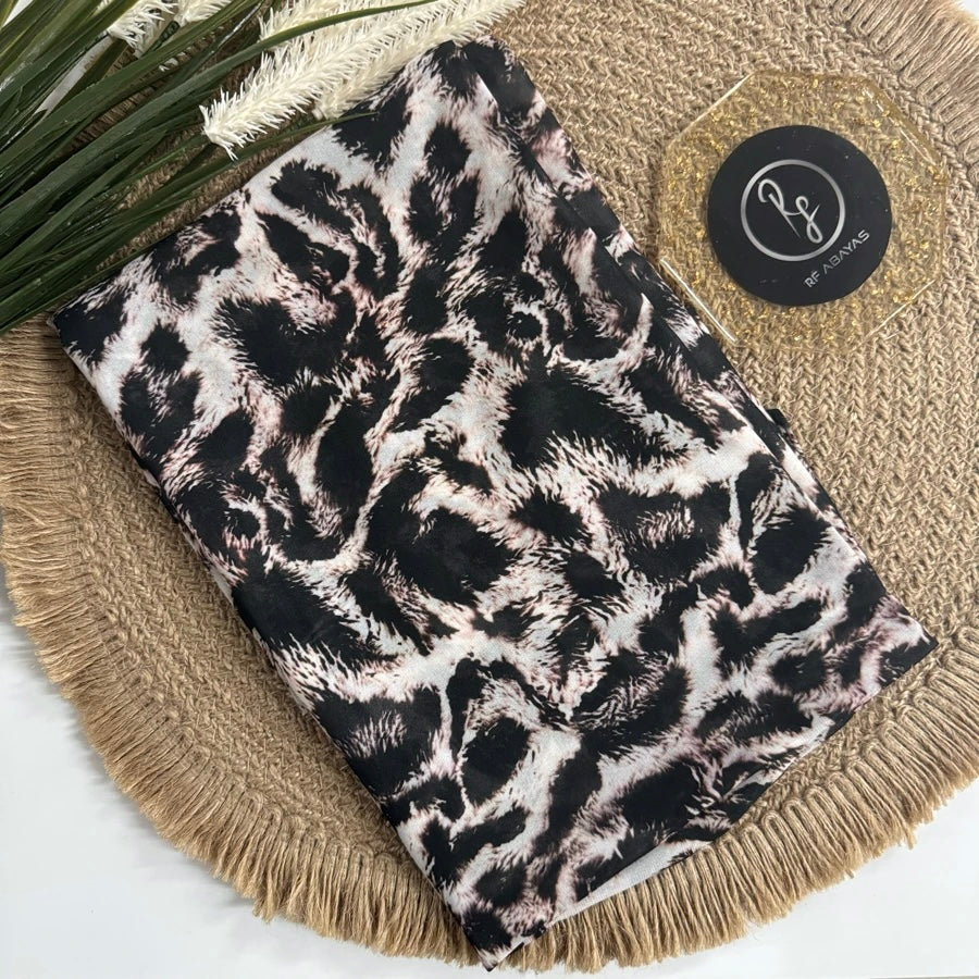 RF Abayas animal print chiffon hijab featuring a stylish, lightweight fabric with a bold animal pattern, perfect for elegant modest wear.