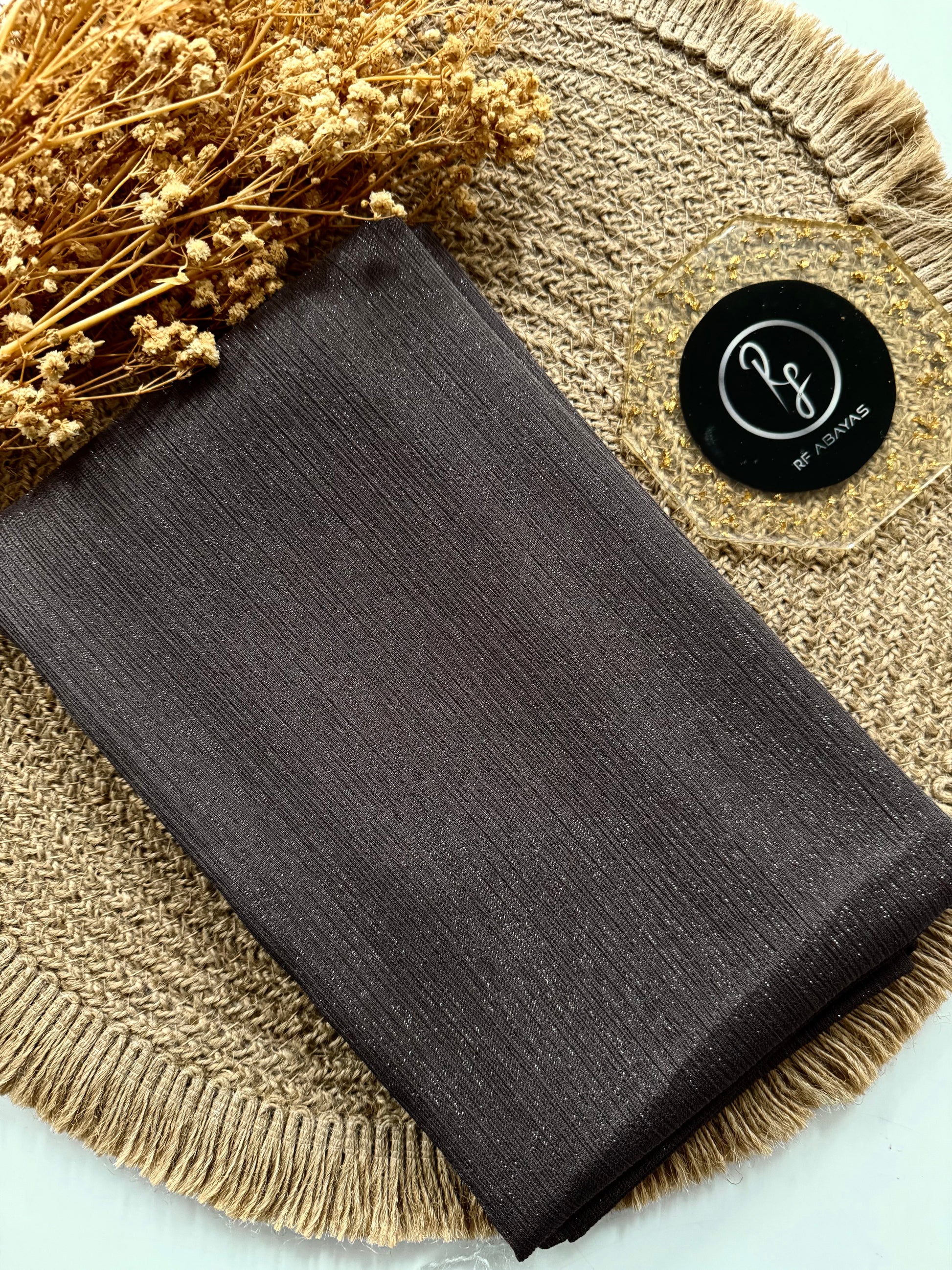 Elegant metallic silk shimmer hijab by RF Abayas, showcasing smooth, shiny fabric with a luxurious metallic finish.