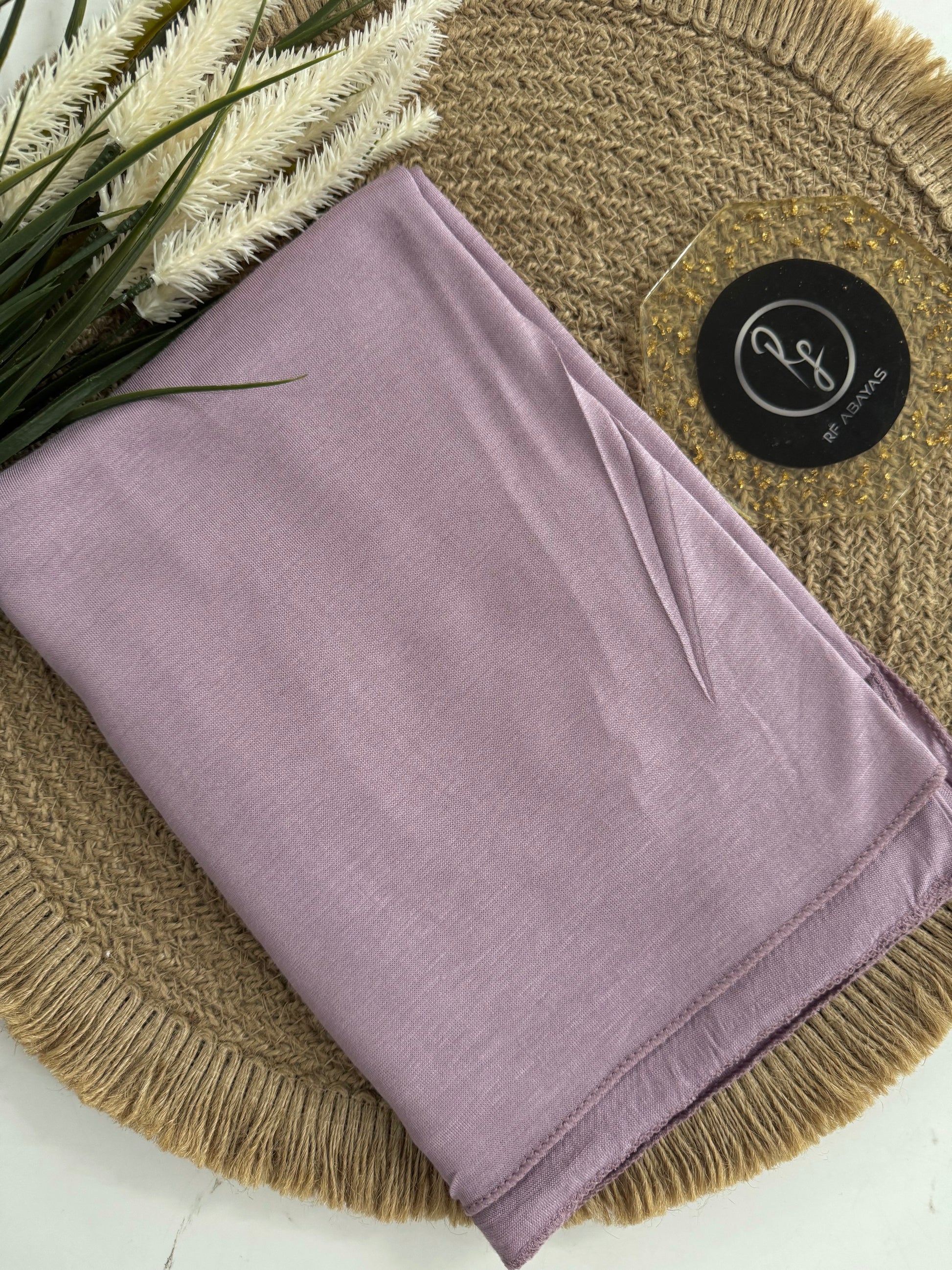 Soft bamboo jersey hijab by RF Abayas in a neutral color, showcasing lightweight, breathable fabric and elegant drape.