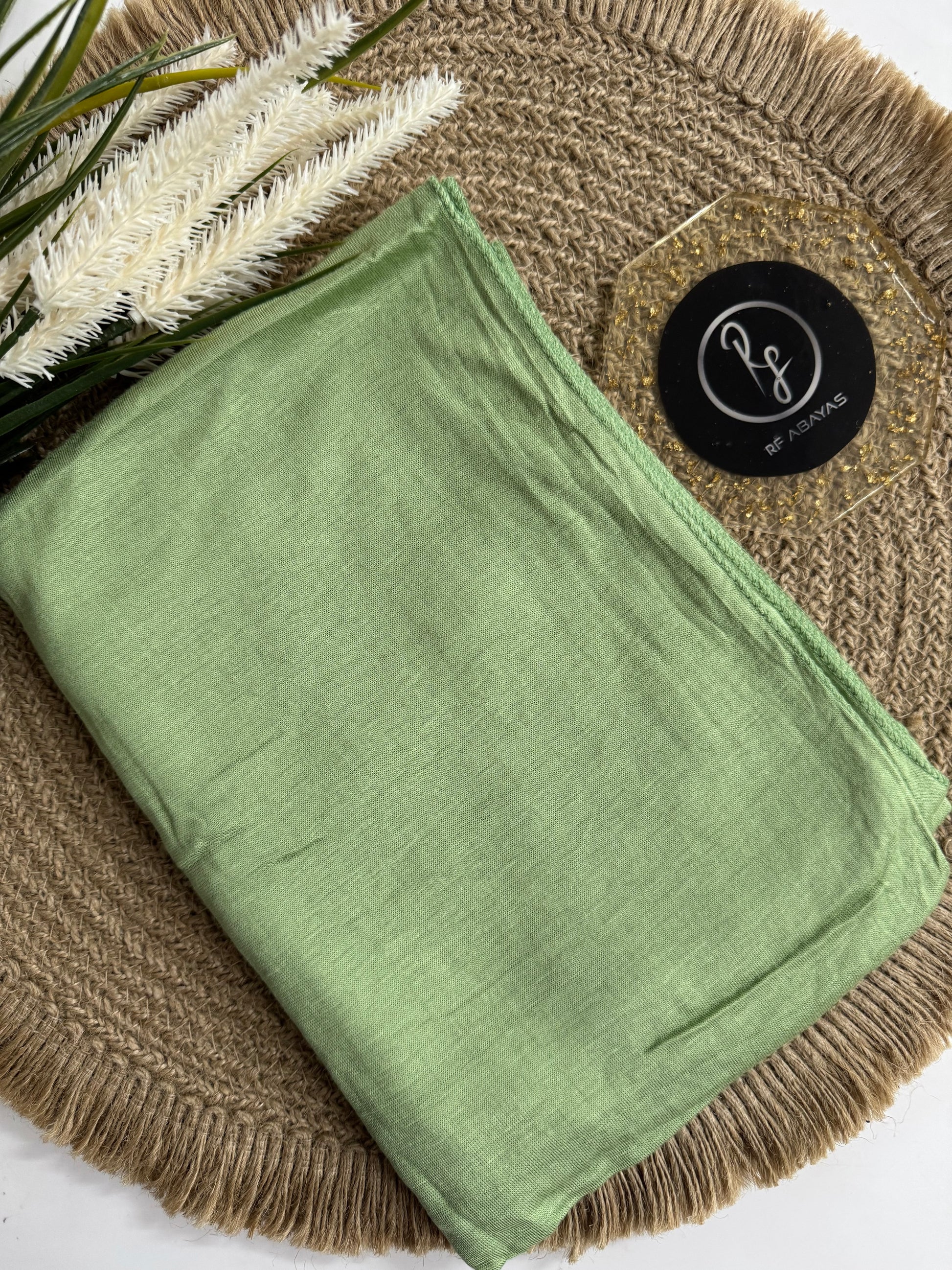 RF Abayas bamboo jersey hijab in neutral tones, lightweight and soft, showcasing its smooth fabric and versatile drape.
