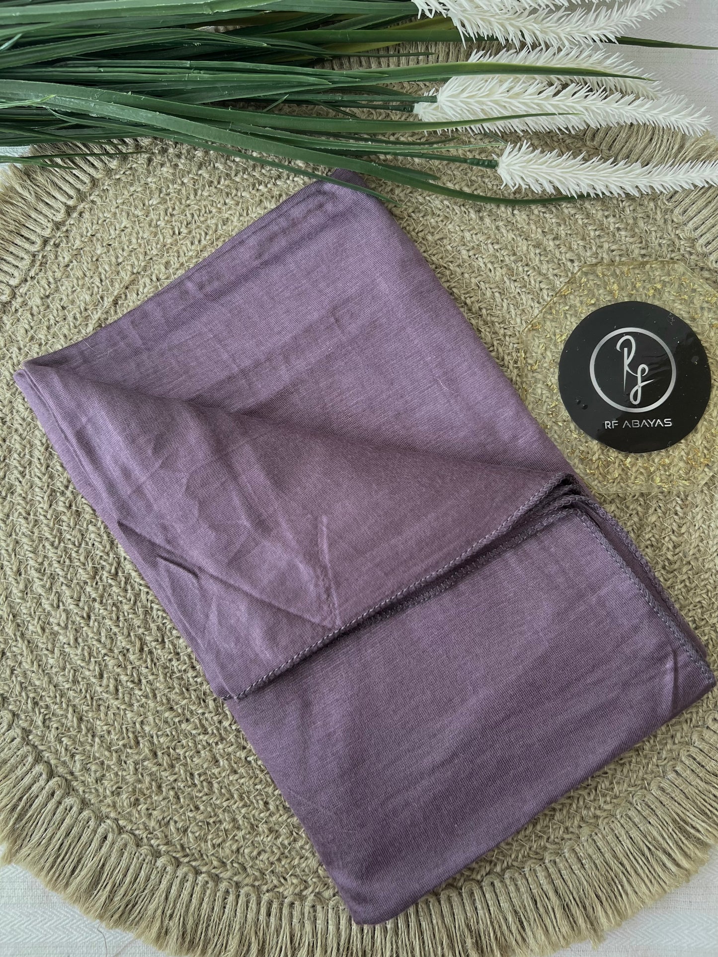 Soft beige bamboo jersey hijab by RF Abayas, featuring lightweight, breathable fabric with a smooth, comfortable drape.