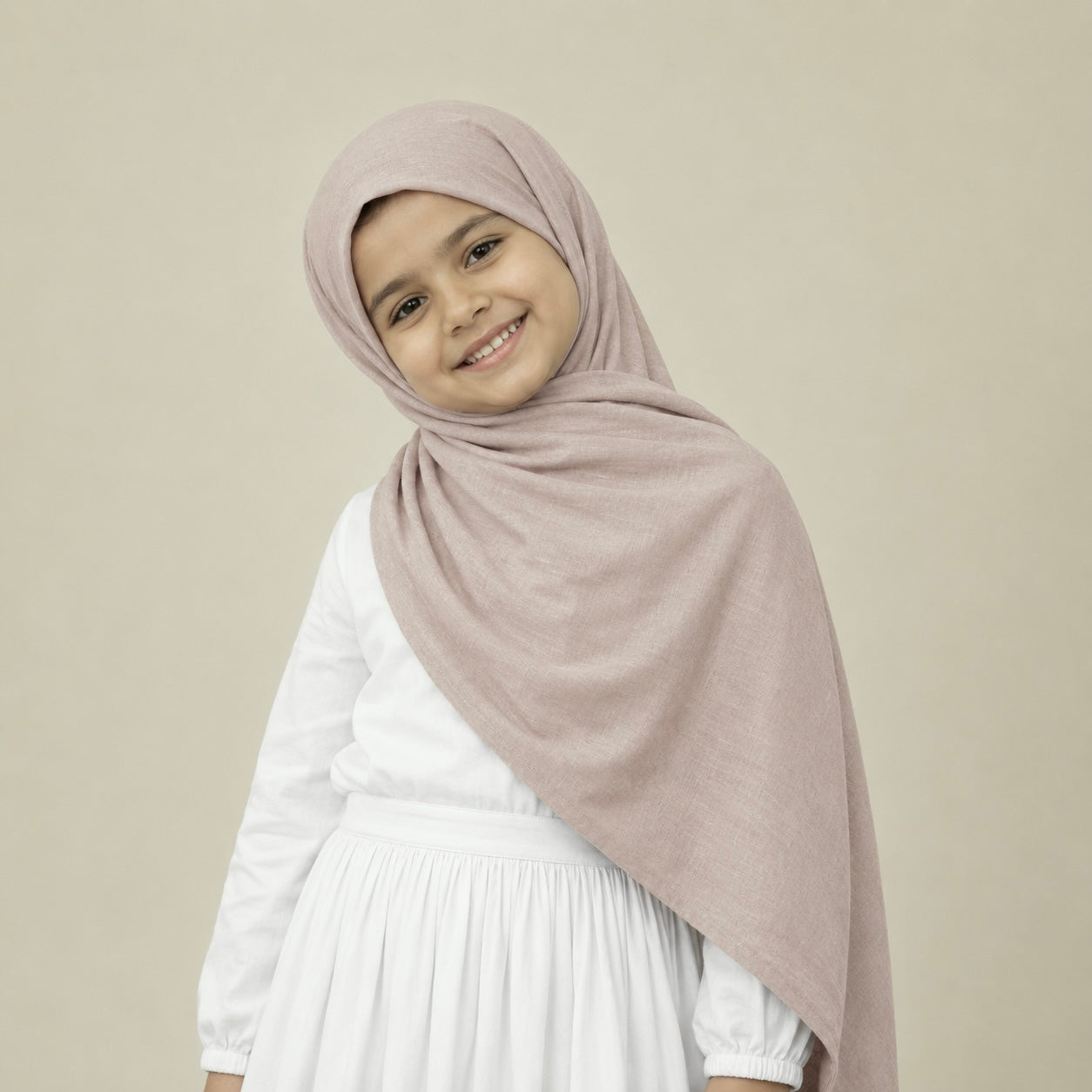 Kids Jersey Hijab by RF Abayas, soft and comfortable baby pink hijab with a simple, elegant design for young girls.