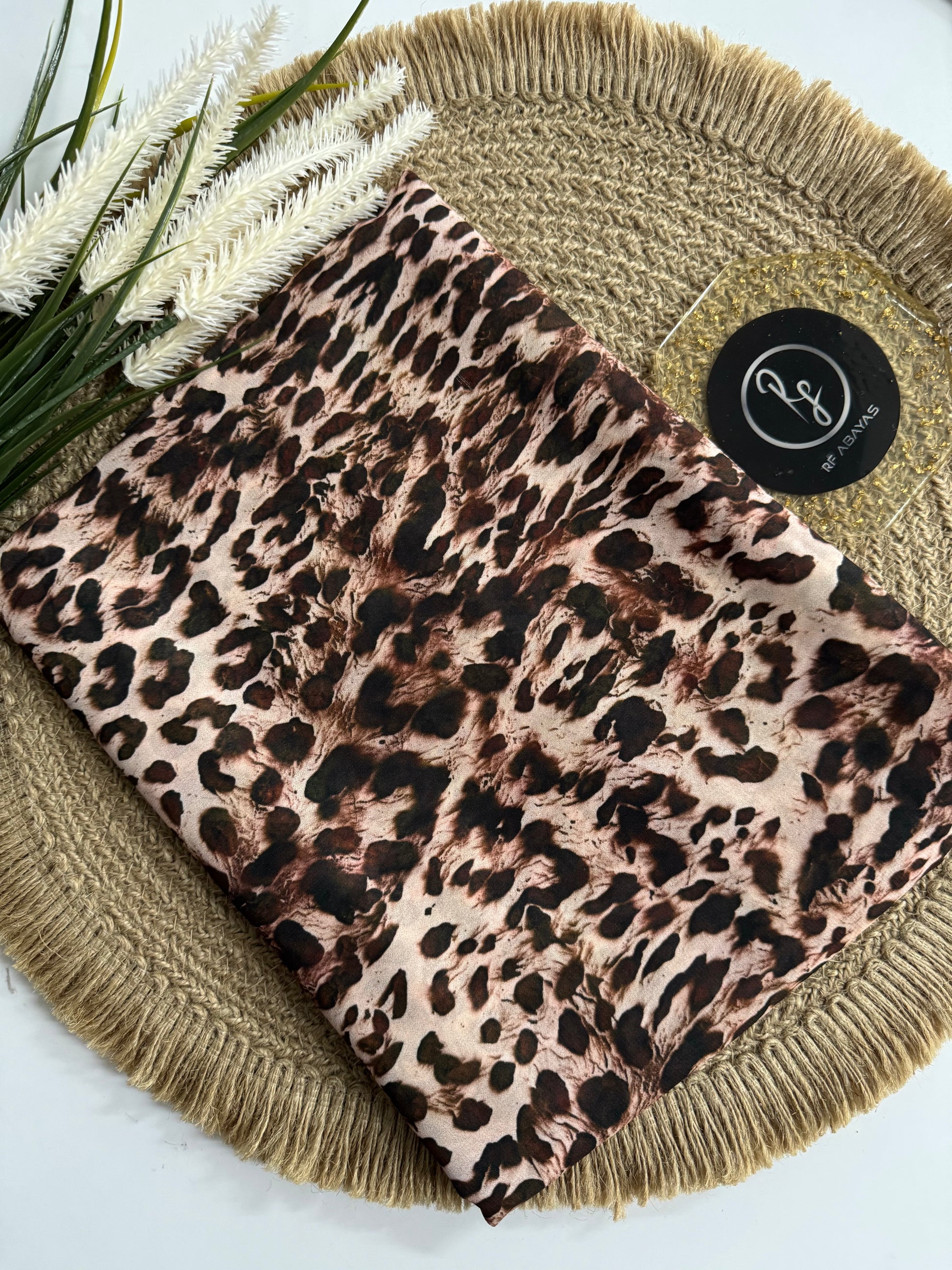 RF Abayas animal print chiffon hijab draped elegantly, showcasing its lightweight, flowing fabric and stylish animal pattern.