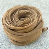 RF Abayas organza shimmer hijab in soft, elegant fabric with a subtle shimmer finish, perfect for stylish modest wear.