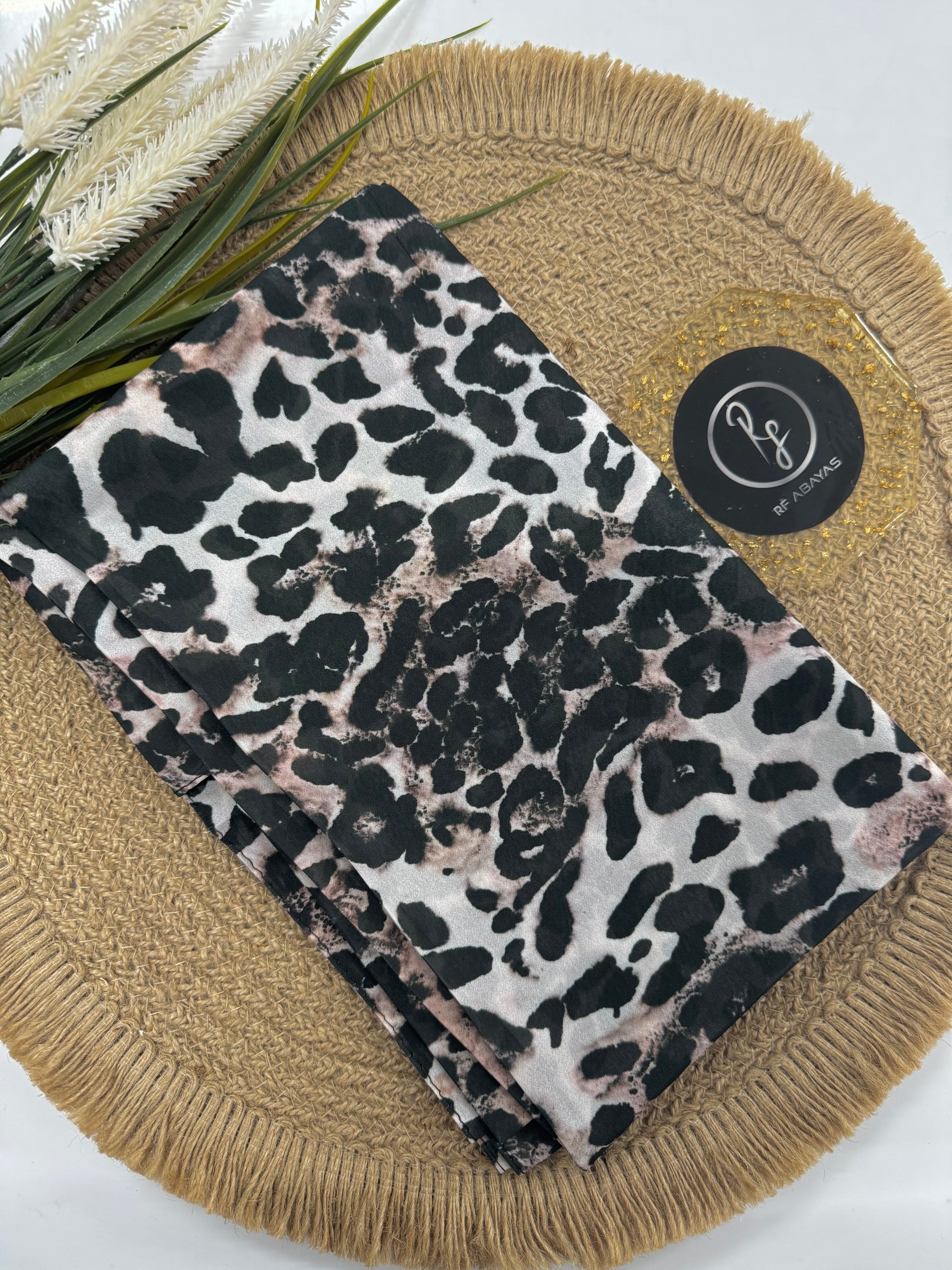 Animal print chiffon hijab by RF Abayas, showcasing a lightweight, flowing fabric with stylish animal pattern design.