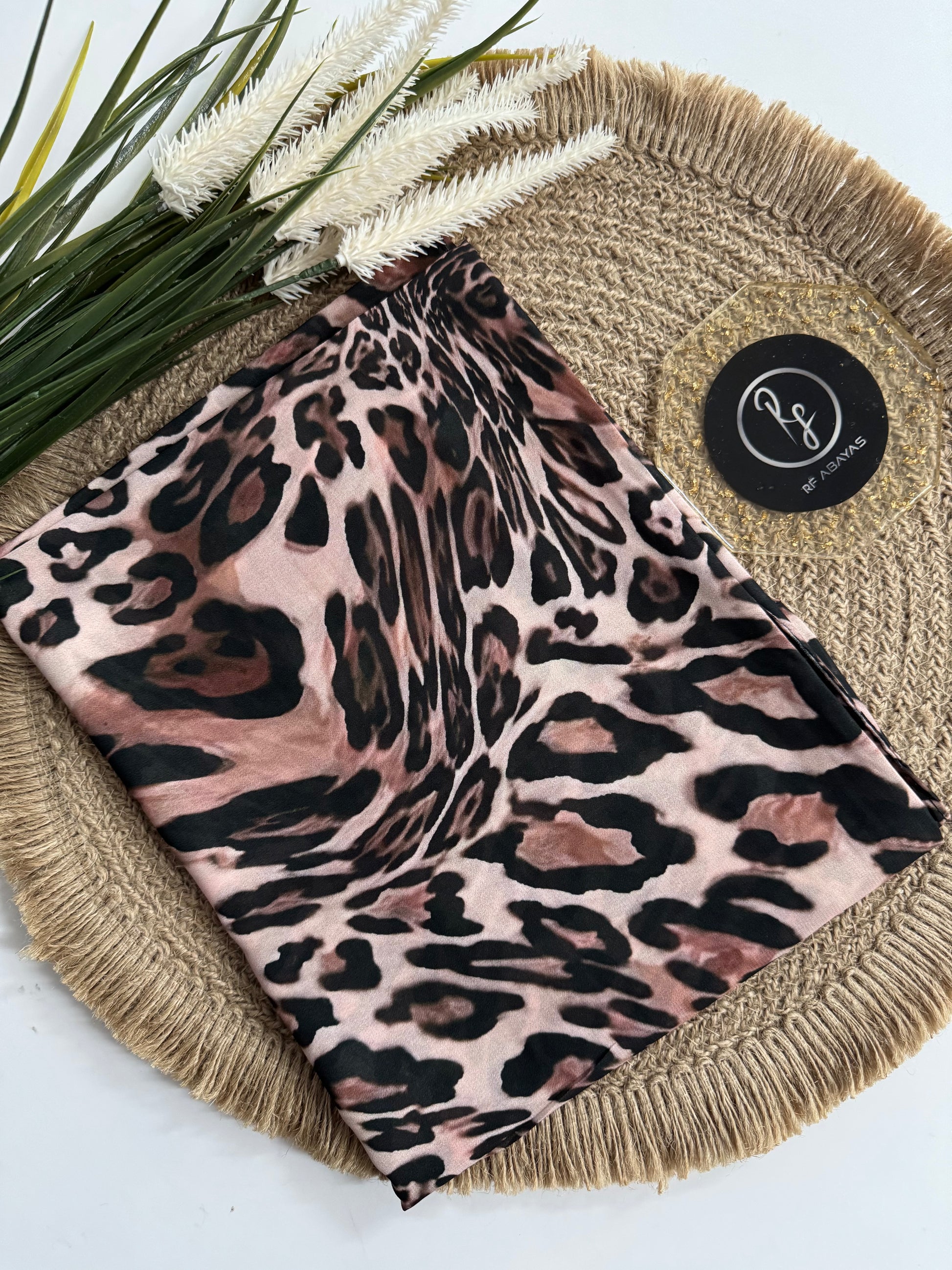 RF Abayas animal print chiffon hijab displayed, showcasing lightweight, flowing fabric with a bold animal pattern.