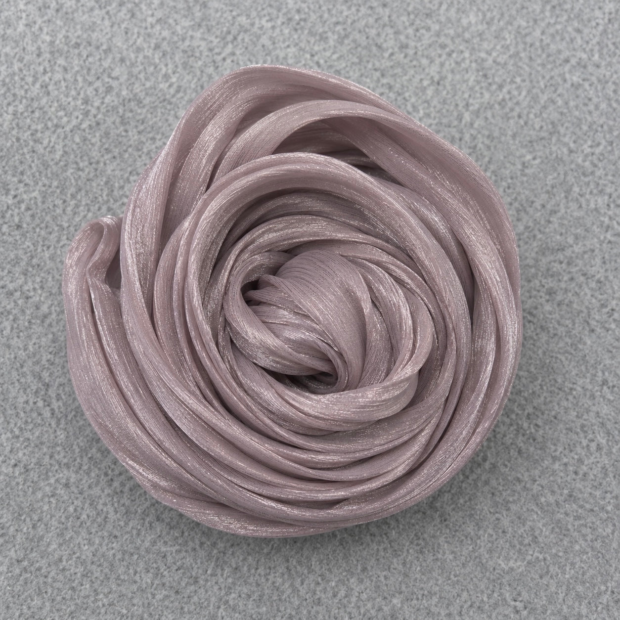 RF Abayas organza shimmer hijab in elegant sheer fabric with a subtle shimmer finish, styled for a graceful look.