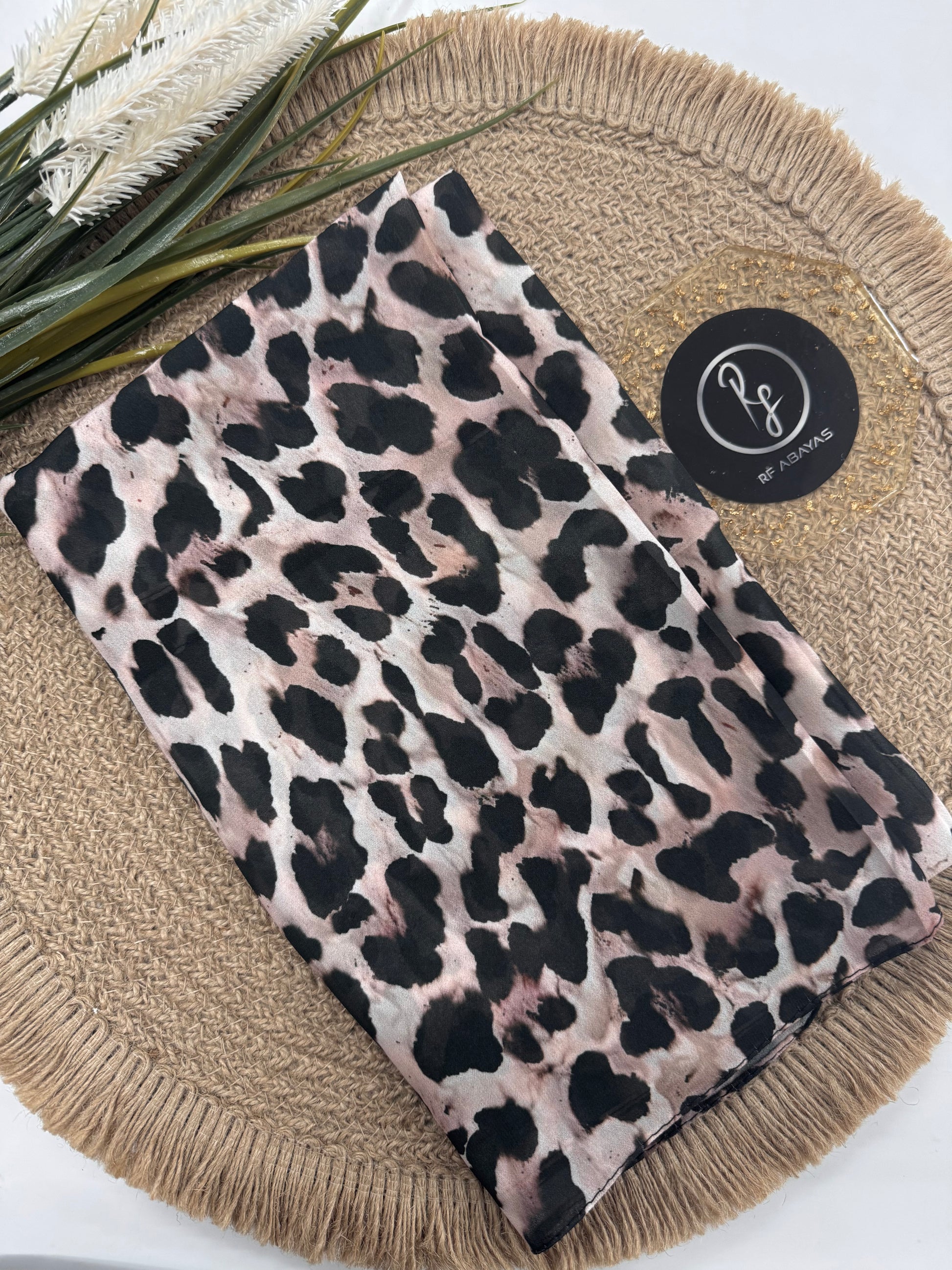 RF Abayas animal print chiffon hijab draped elegantly, showcasing its lightweight, flowing fabric and stylish animal pattern.