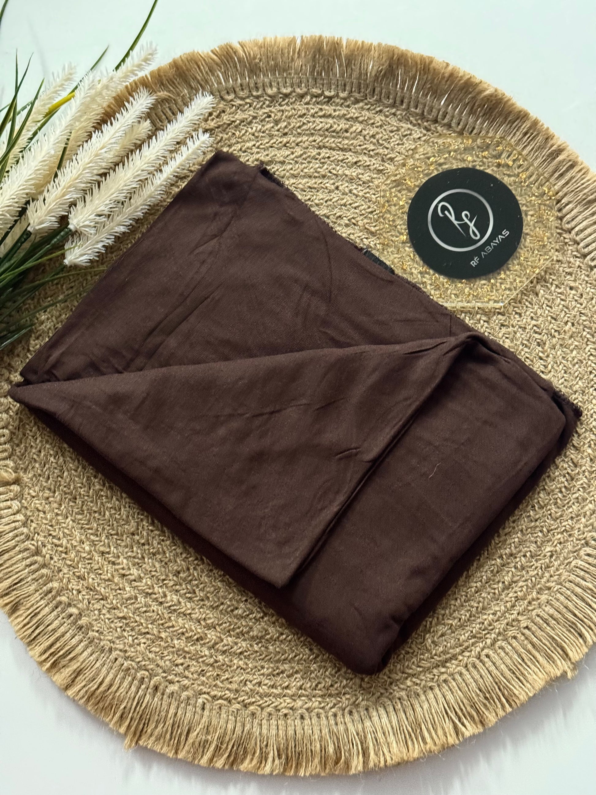 Ivory bamboo jersey hijab by RF Abayas, soft and breathable fabric, showcasing a lightweight, comfortable head covering.