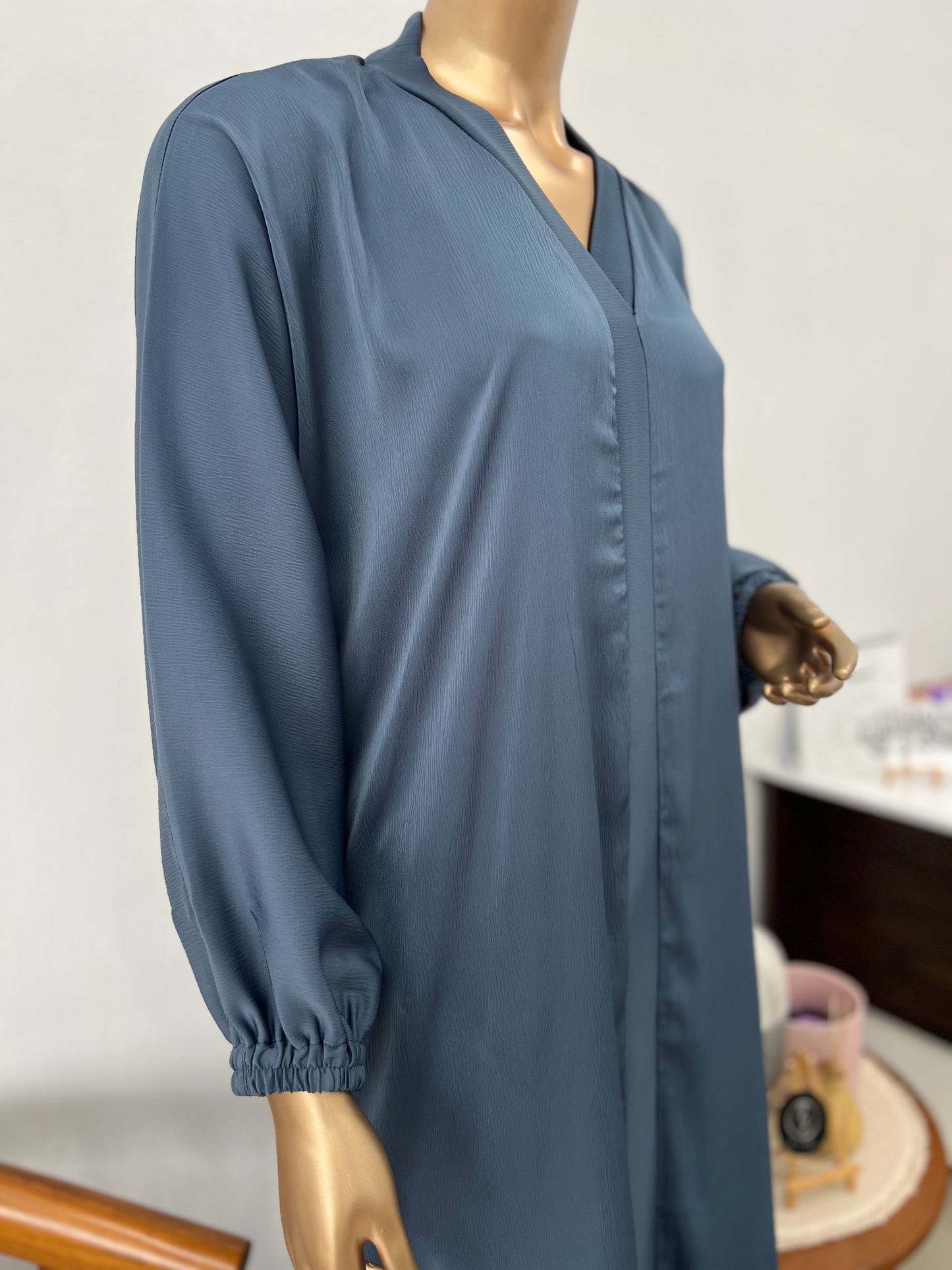 Dark slate blue RF Abayas Everyday Comfort TikTok Abaya, flowing modest dress with long sleeves and elegant design.