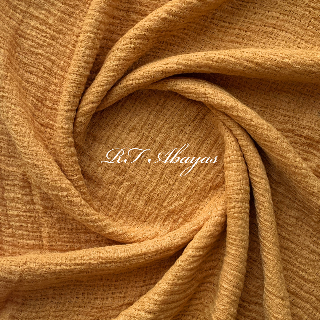 Heavy crinkled cotton hijab from RF Abayas in meroon color, showcasing its textured, lightweight fabric and stylish drape.