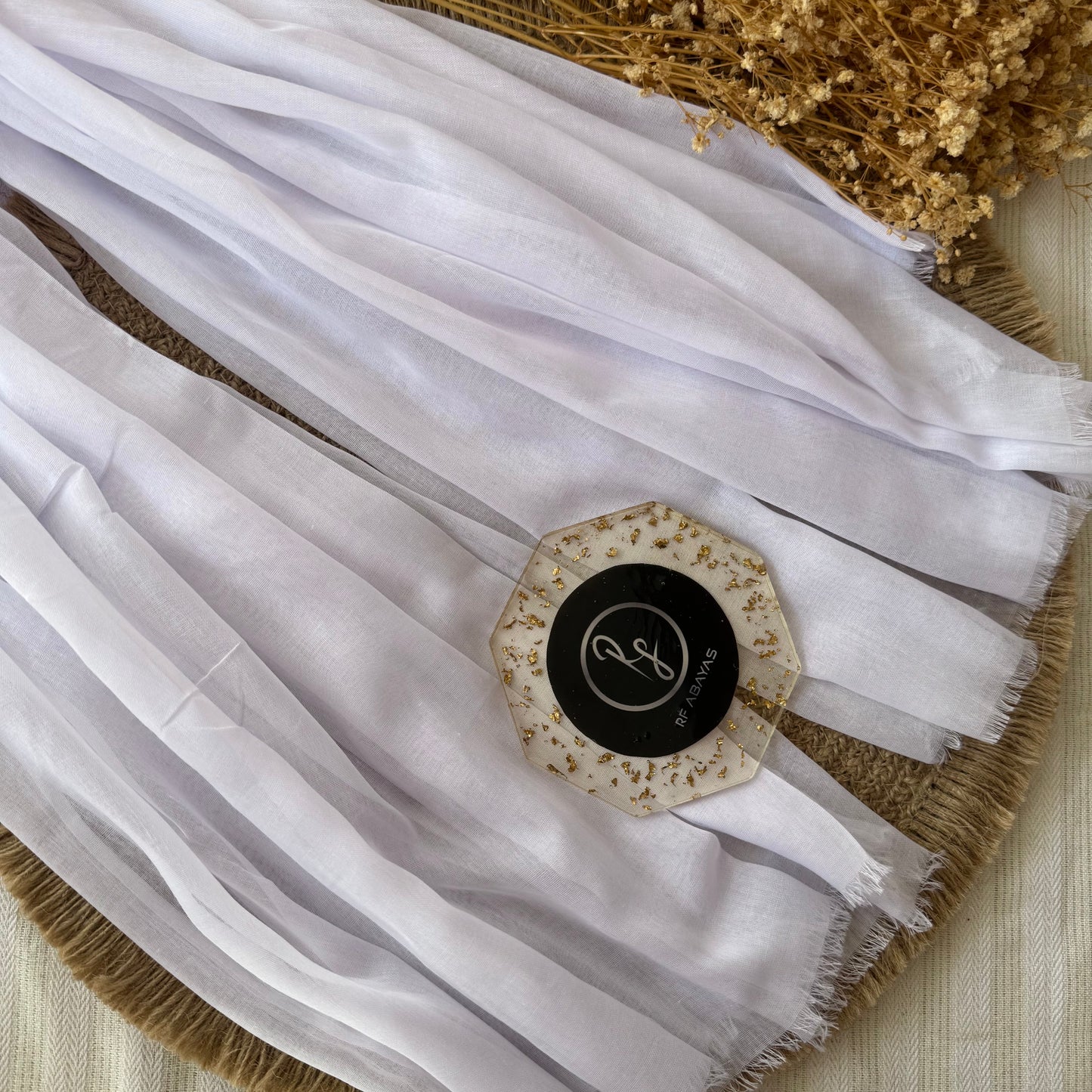 Pure cotton hijab with wrinkle-free finish, folded for display