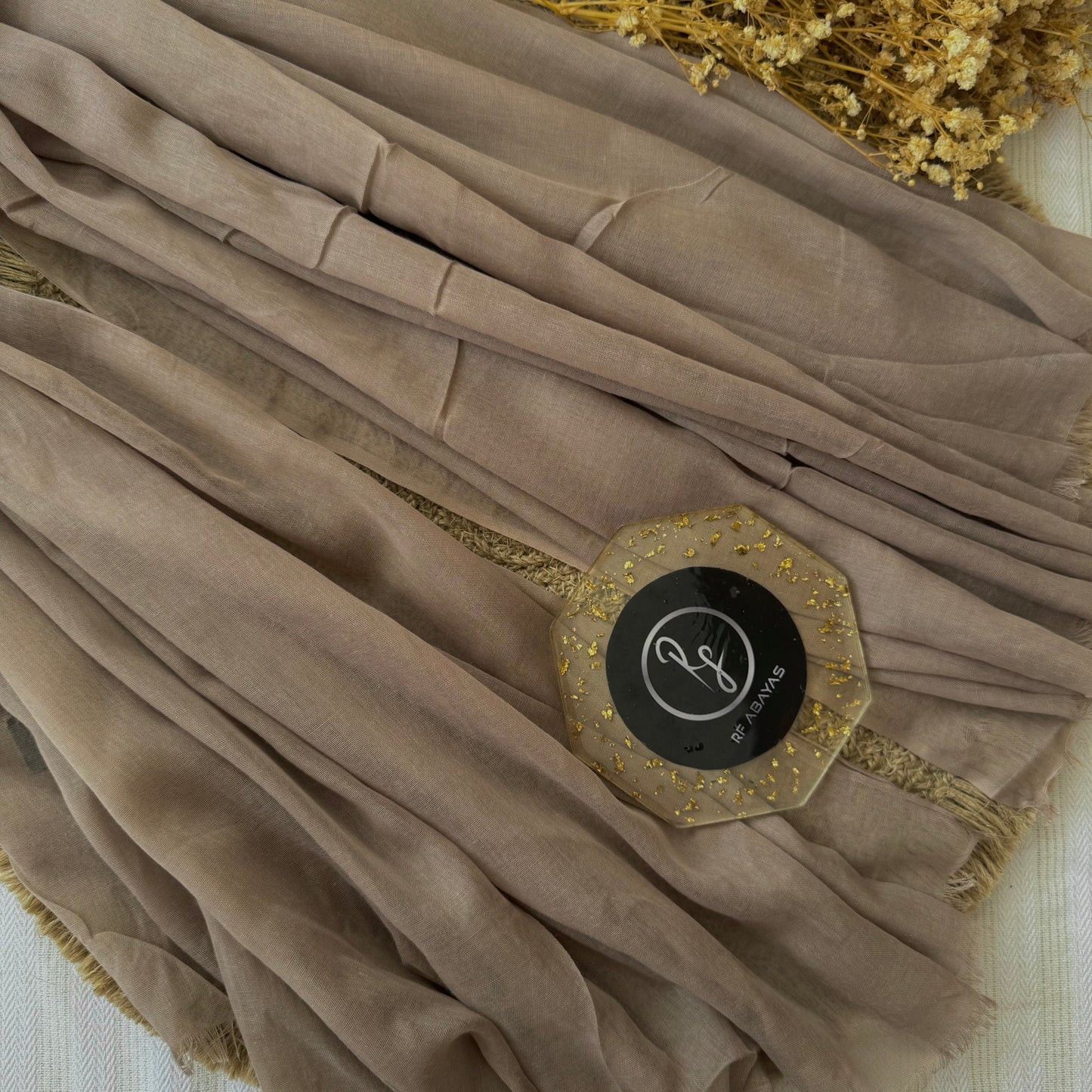 Pure cotton hijab with wrinkle-free finish, folded for display