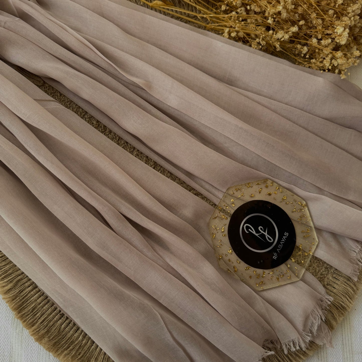 Pure cotton hijab with wrinkle-free finish, folded for display