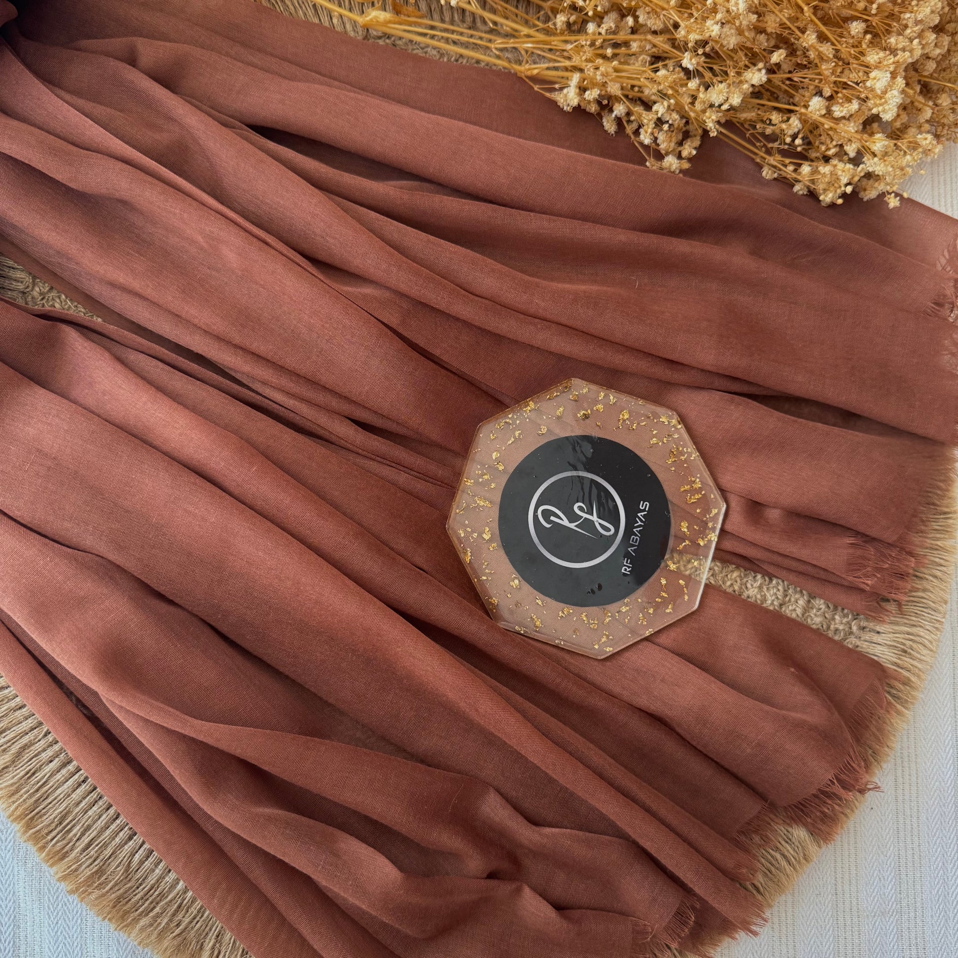 Pure cotton hijab with wrinkle-free finish, folded for display