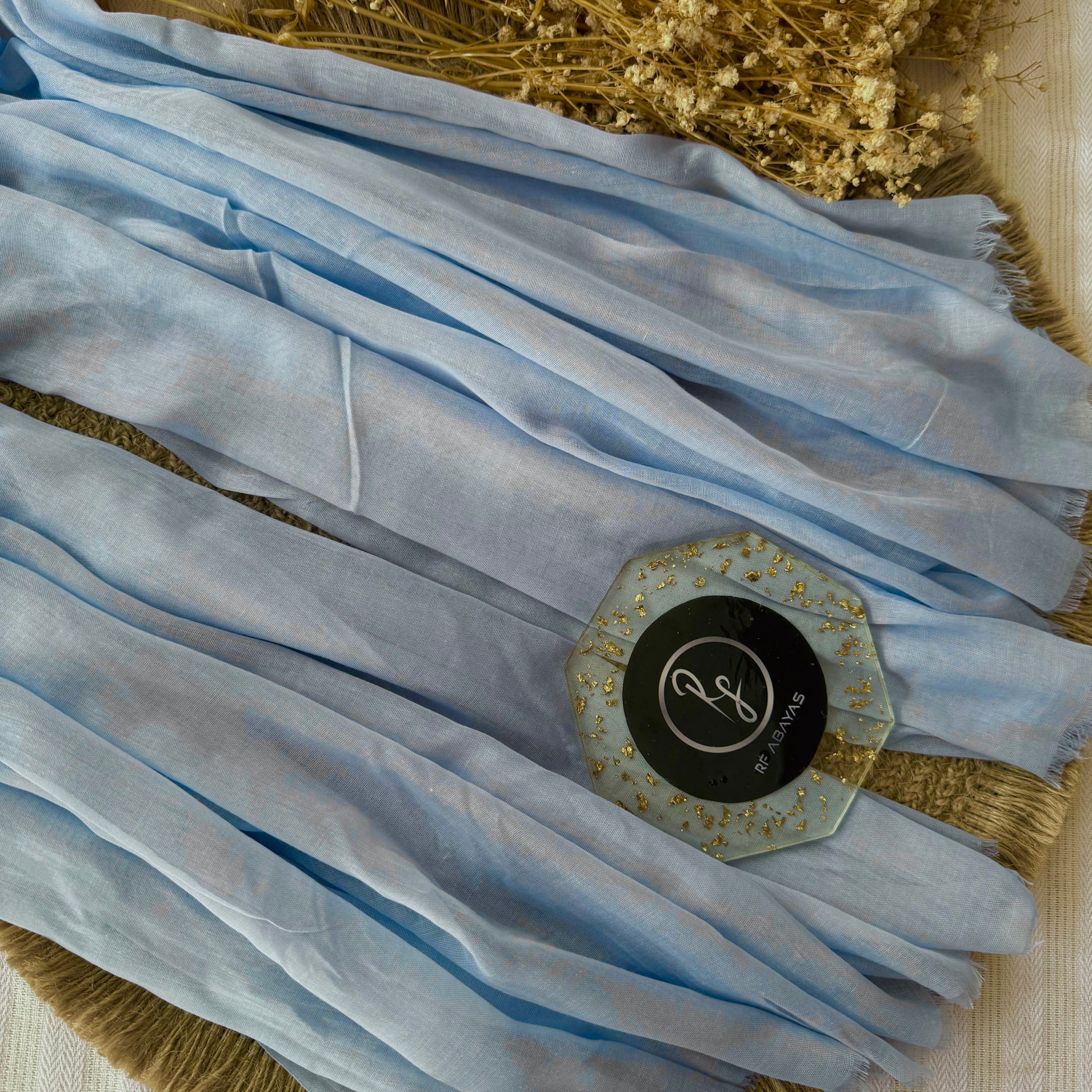 Pure cotton hijab with wrinkle-free finish, folded for display