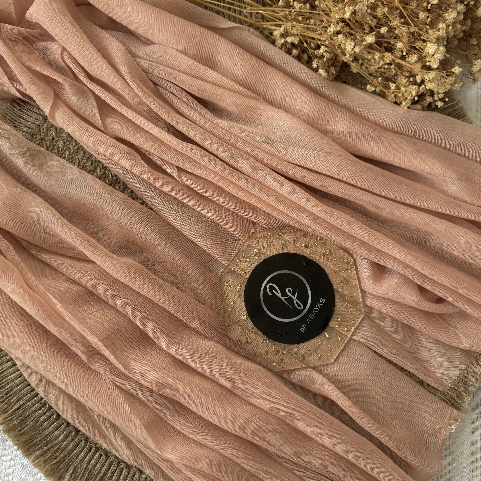 Pure cotton hijab with wrinkle-free finish, folded for display