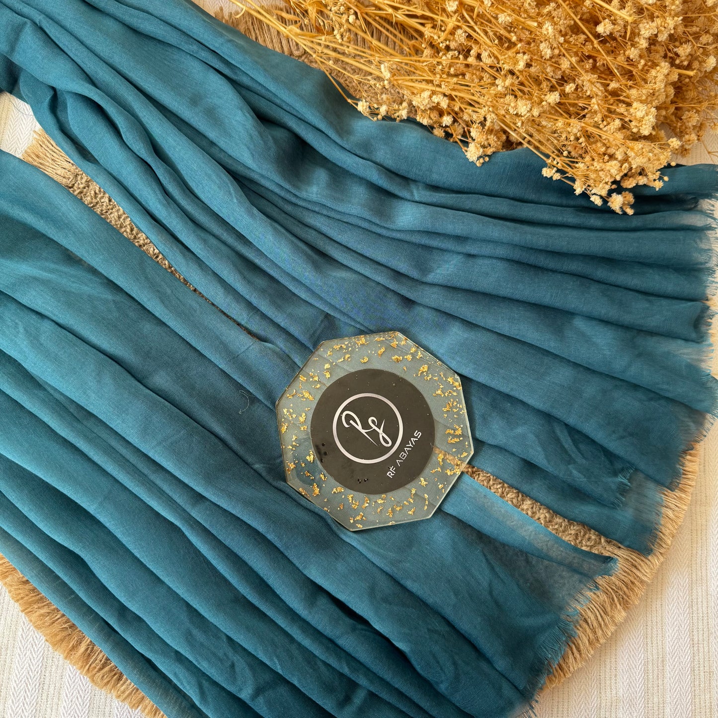 Pure cotton hijab with wrinkle-free finish, folded for display