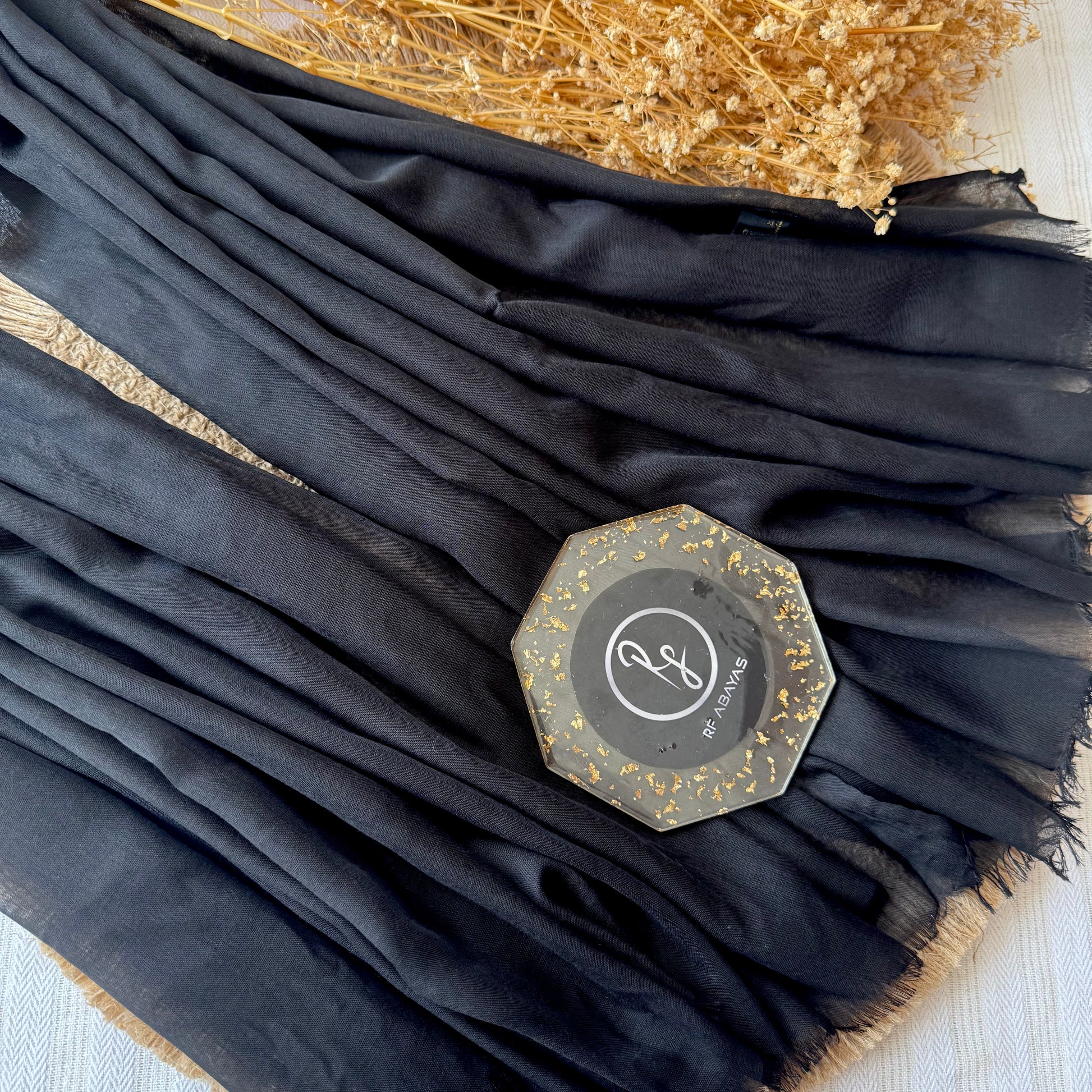 Pure cotton hijab with wrinkle-free finish, folded for display