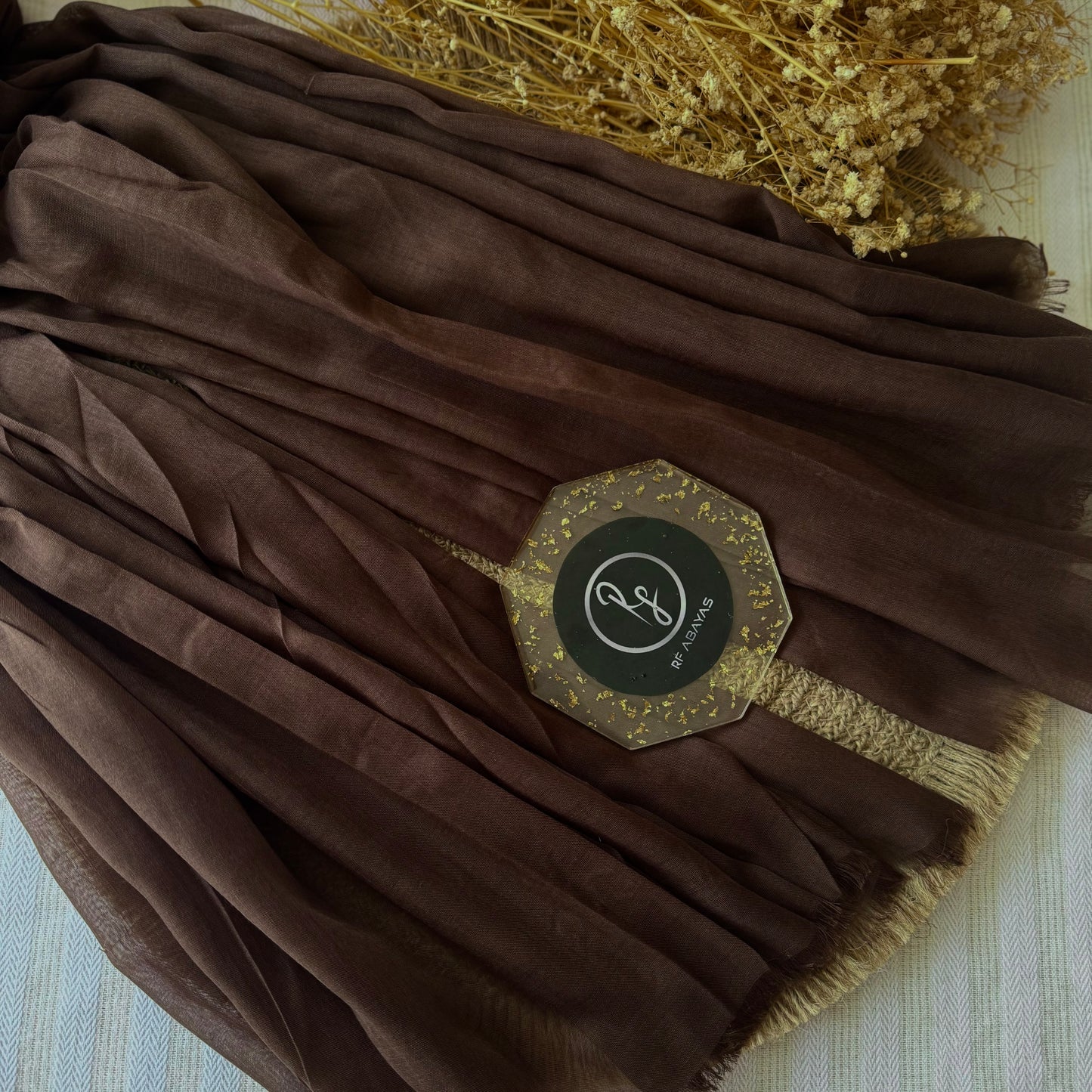 Pure cotton hijab with wrinkle-free finish, folded for display