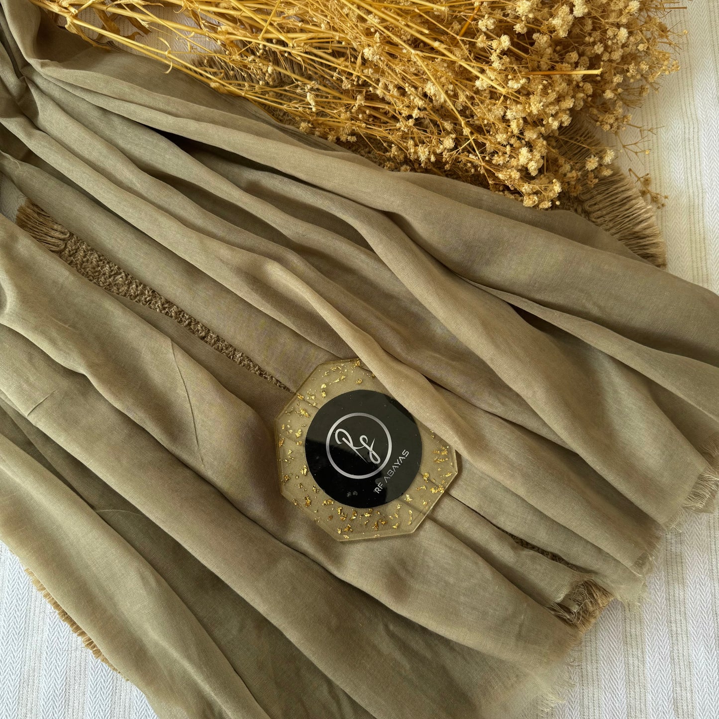 Pure cotton hijab with wrinkle-free finish, folded for display