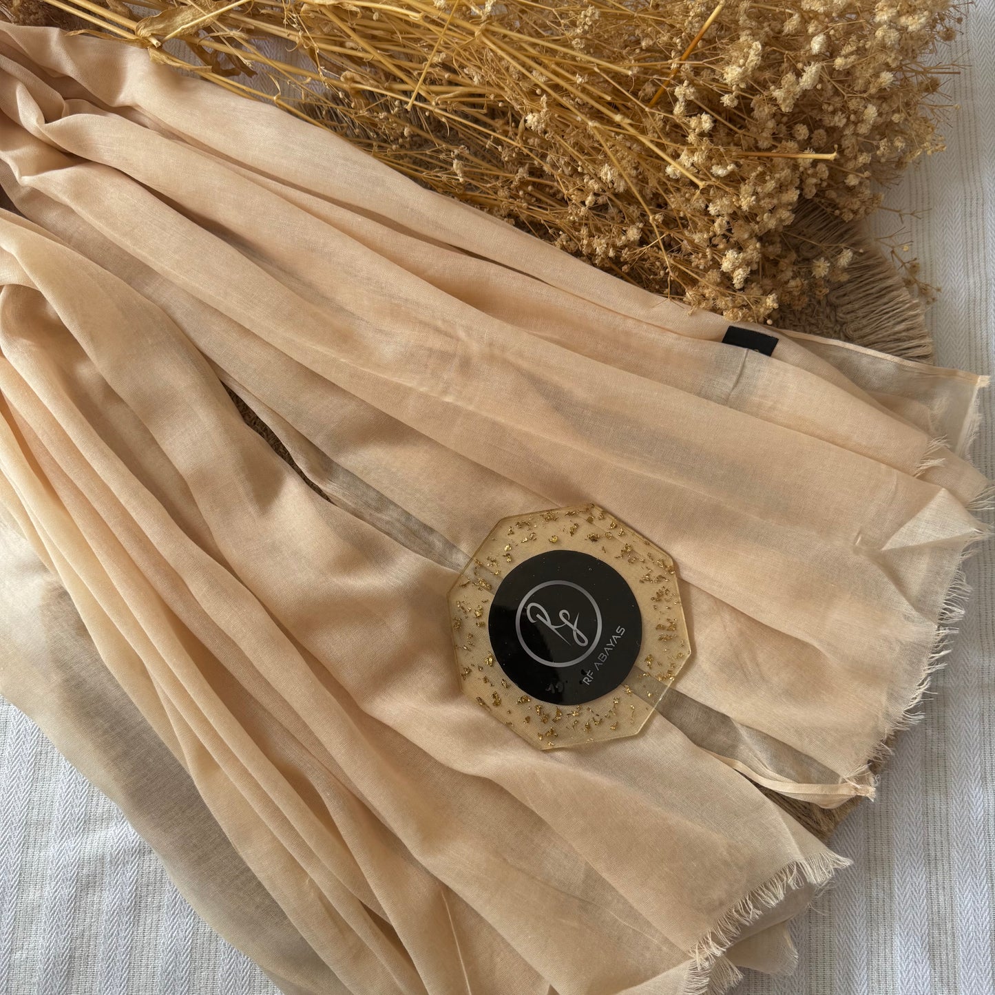 Pure cotton hijab with wrinkle-free finish, folded for display