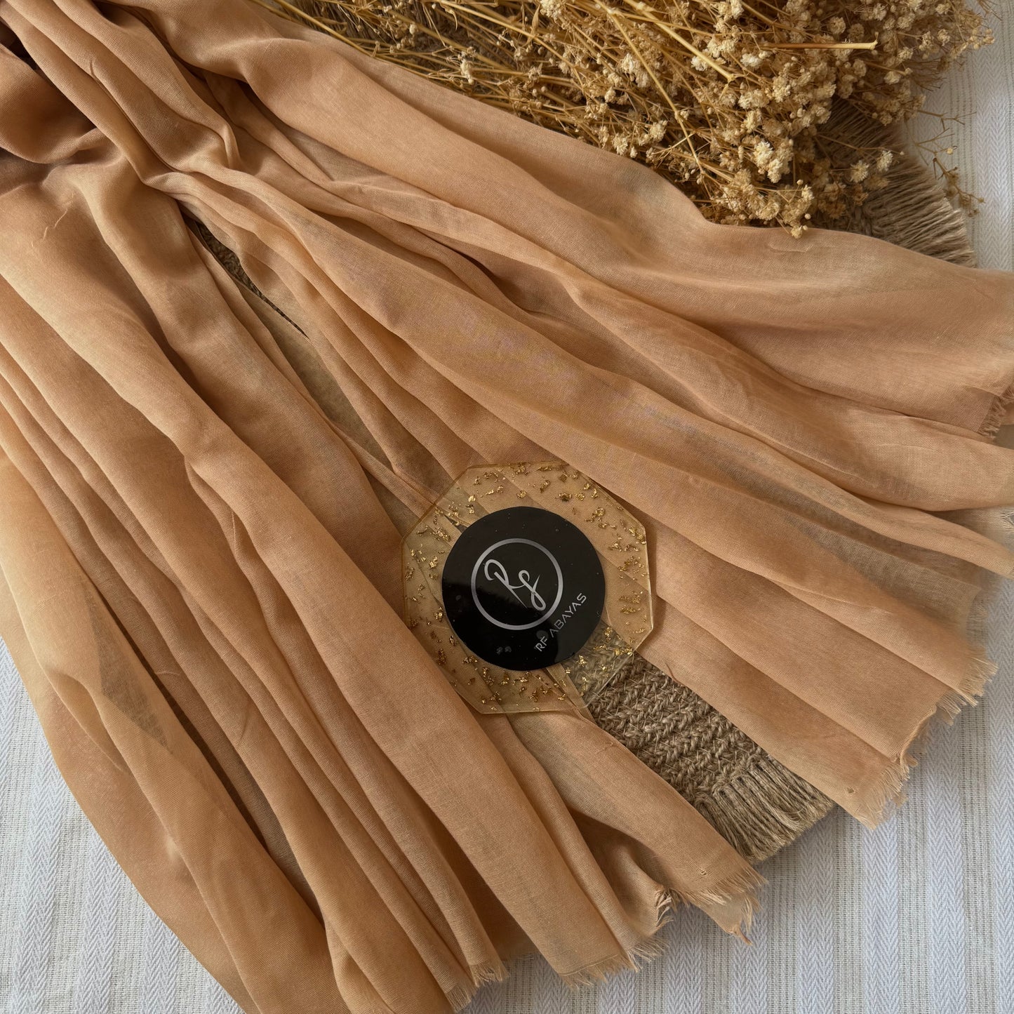 Pure cotton hijab with wrinkle-free finish, folded for display